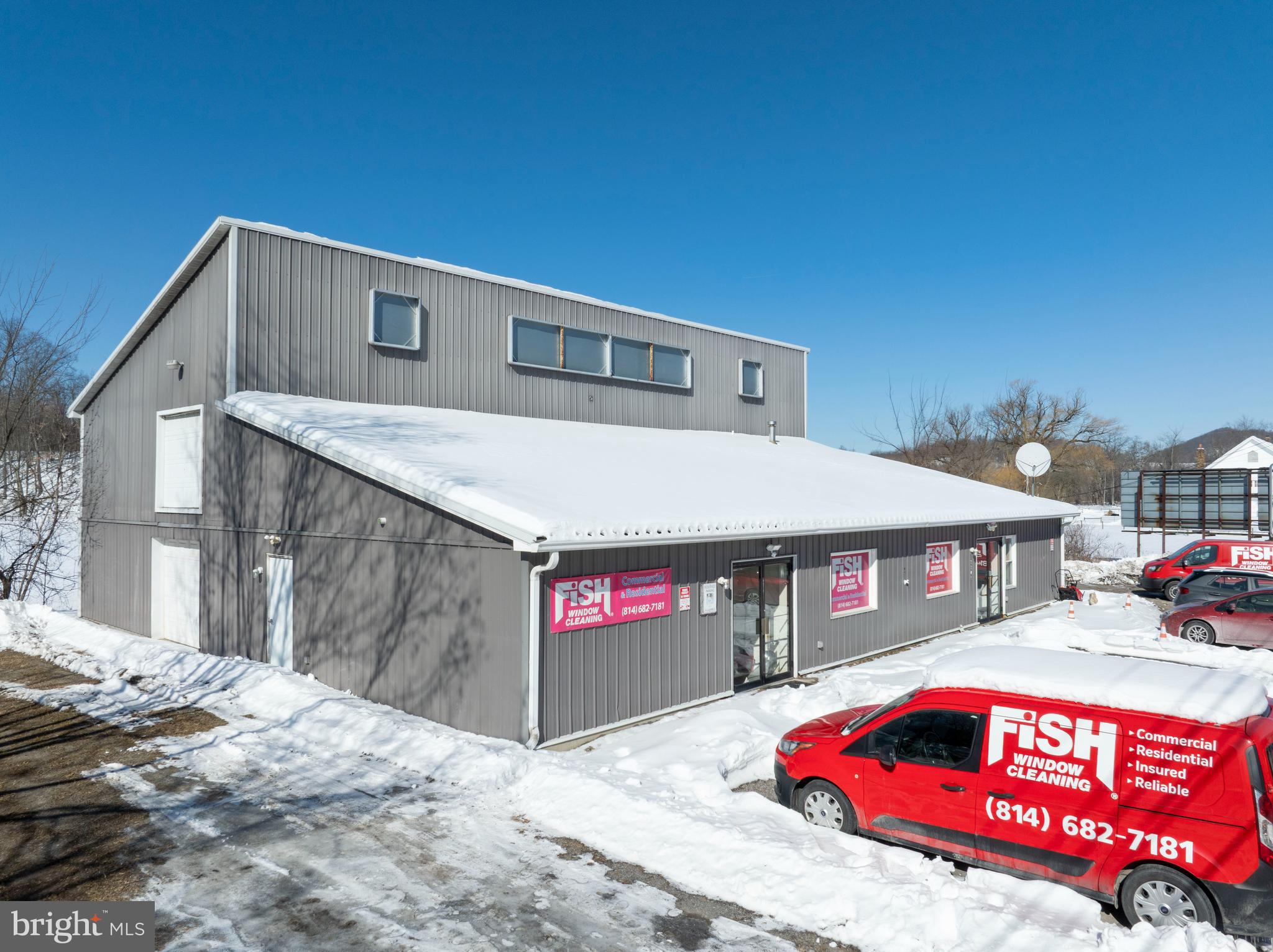 Commercial property on East Pleasant Valley Blvd in Bellwood with income in place. The front portion is currently leased through December 2028, providing immediate cash flow. The rear garage/warehouse space and entire second floor are vacant and ready for owner use or additional rental income (see floor plans in listing photos). The warehouse portion includes two roll-up doors (8’ and 14’) and is well suited for storage, contractor use, or light industrial operations. The property offers parking for approximately 12–15 vehicles, washer and dryer hookups, a small kitchenette with refrigerator, and numerous built-in shelving units. Conveniently located along East Pleasant Valley Blvd with strong road exposure, this property presents a solid opportunity for investors or business owners seeking flexible commercial space with income already in place.