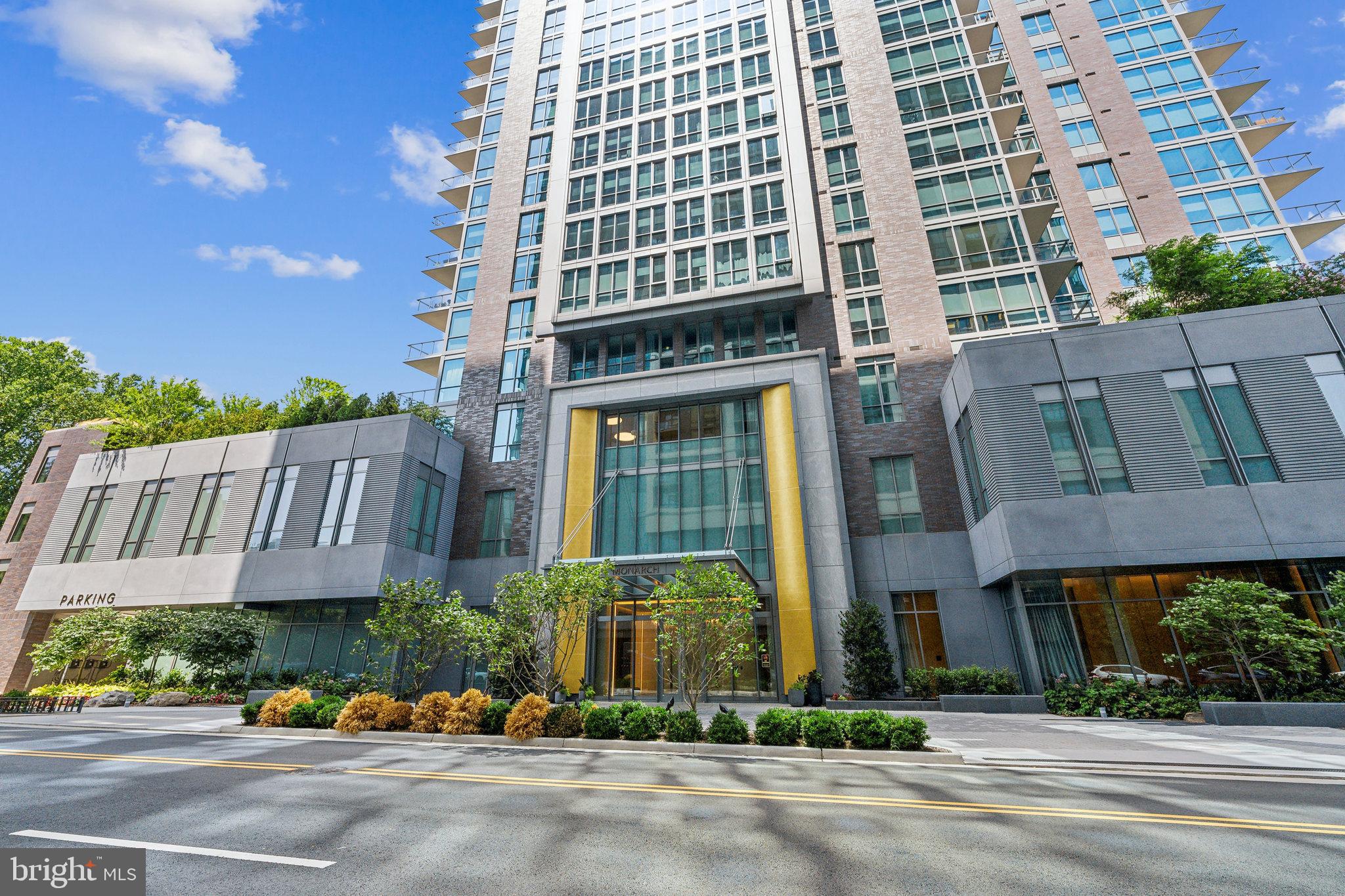 Indulge in unparalleled luxury within this exquisite 3-bedroom, 3-bathroom McLean-Tysons Corner condominium. Soaring 11-foot ceilings, and masonry walls ensure privacy and peaceful living.
A direct access elevator whisks you up 17 floors to a grand private foyer, setting the stage for breathtaking city panoramic views and sophisticated finishes.  Breeze inside the sunlit contemporary interiors, complemented by over 280 square feet of private outdoor space.  The gourmet kitchen is a chef's dream, featuring top-of-the-line Miele appliances, a concealed-panel refrigerator and dishwasher, all white soft-close ItalKraft kitchen cabinets with underlighting, and a waterfall quartz island. The expansive living room with a tray ceiling provides an ideal space for entertaining, while the sunlit breakfast room offers a cozy spot for casual dining.  Pristine Khars white oak hardwood floors carried throughout the home. Each of the 3 bedrooms are designed for tranquility, with spacious walk-in closets and luxe bathrooms featuring oversized showers with frameless glass doors and built-in seats. The primary bathroom offers a freestanding soaking bath and double vanities, which can also be found in the second bathroom.  The second bedroom includes a private balcony, perfect for enjoying peaceful mornings or relaxing evenings. For added convenience, the property is equipped with spacious ceiling high cabinets and plenty of storage, and comes with five new air filters installed in July 2024. The elegance extends beyond Unit #1703, with a state-of-the-art fitness room offering on-demand Echelon workouts, a sparkling outdoor pool, special dog grooming suite, and beautifully landscaped butterfly gardens. Additional amenities include a versatile garden terrace, a clubroom lounge with a catering kitchen, and a penthouse vista suite for private events.  Conveniently located within a short distance to the Silver Line Metro, this opulent condo offers easy access to Washington, DC, and major airports. With nearby dining, shopping, and entertainment options, including Tysons Galleria and Whole Foods, this residence combines urban sophistication with serene green spaces.   Included are two assigned garage parking spaces, side by side next to the public and private elevators.  Experience the epitome of refined living with your very own 3-bedroom condominium right in the heart of Tysons Corner. Schedule your private viewing today for this extraordinary home.