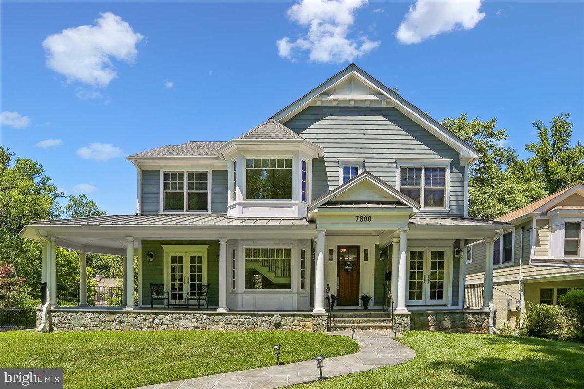 Welcome to 7800 Radnor Rd, open house on Sunday, 6/21 from 1-4pm! Built in 2017 by Block Builders, this stunning and thoughtfully crafted home checks all the boxes. Sit outside and enjoy the beautiful weather from the covered, wrap-around front porch. The main level blends formal and open concept spaces perfect for multiple uses.  Begin in the formal Living Room complete with private fireplace, then step into the open Living Room (with second fireplace), Dining Room, and spacious Kitchen, perfect for lounging or entertaining.  The Kitchen comes complete with a private pantry. Both the Living Room and Kitchen provide access to the rear deck. The main level Office provides perfect work-from-home privacy. On the upper level you will find the spacious Primary Bedroom, complete with two closets, a Juliet balcony allowing ample natural light, and the large Primary Bathroom. A second ensuite Bedroom with a walk-in closet, as well as the third full Bathroom servicing the third and fourth Bedrooms complete the upper level. The lower level features a Rec Room, fourth full Bathroom, and fifth Bedroom! Interior entry from the two car garage on the lower level. Elevator services all three levels for ease transporting heavy daily items like groceries, or for personal use.
