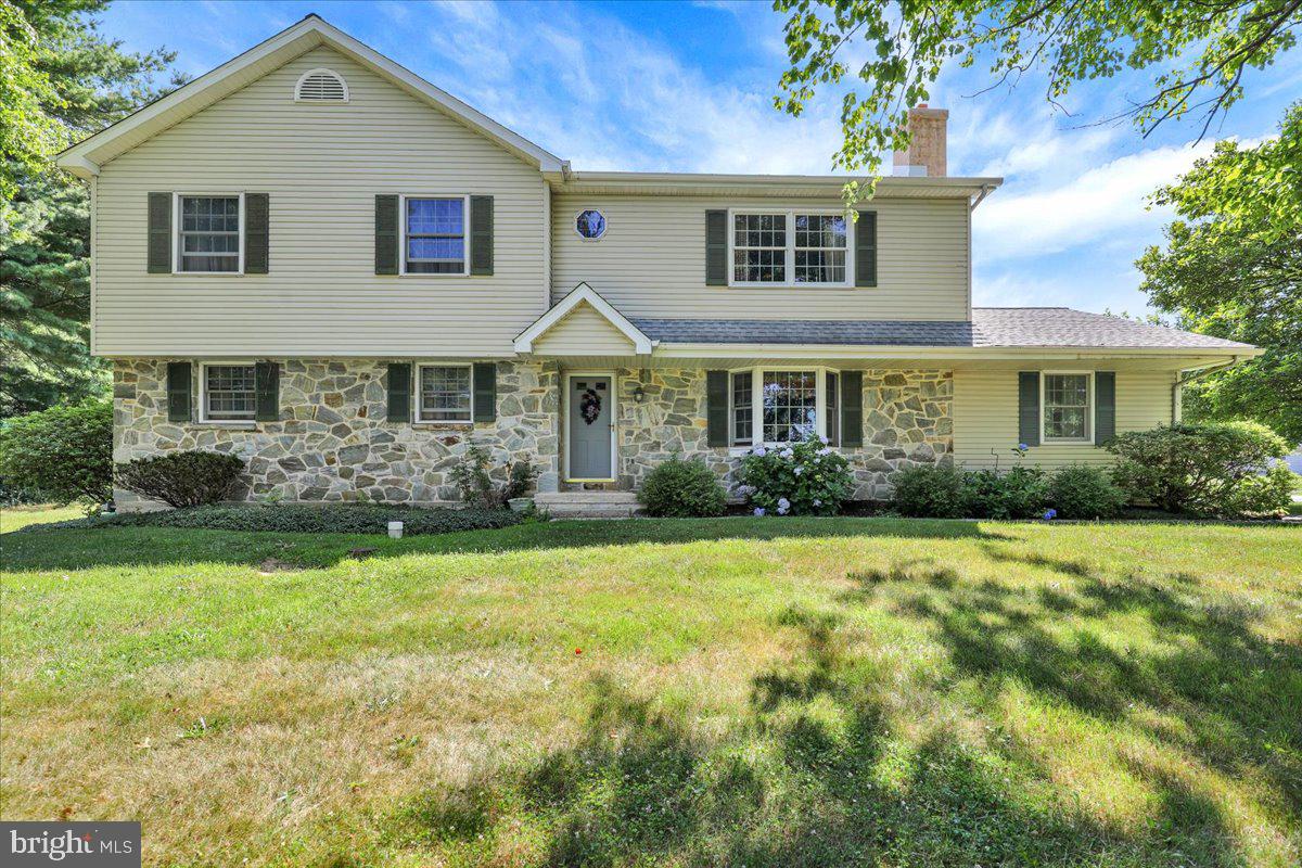 Welcome to this exceptional property in the highly sought-after Downingtown School District! Situated on an amazing lot of over 2 acres with low taxes, this 4-bedroom, 3 full and 1 half bath home offers space, flexibility and incredible outbuildings rarely found together.

Inside, you'll find a spacious and functional layout with the option for a first-floor primary suite complete with a full bath. The convenient first-floor laundry room includes a half bath. The updated kitchen features beautiful wood cabinetry, new quartz countertops, stainless steel appliances and plenty of workspace for cooking and entertaining.

The dining room showcases hardwood flooring, a wood-burning fireplace and a large bay window that fills the space with natural light. Just off the main living area, the screened-in back porch provides the perfect place to relax and enjoy the peaceful setting. A comfortable rec room with carpeting offers additional living space for family gatherings, hobbies, or a playroom.

Upstairs, you'll find three generously sized bedrooms, a full hall bath, and a spacious primary suite with a huge walk-in closet and an ensuite bath featuring a jetted tub and separate walk-in shower. A full attic provides even more storage.

The full basement includes Bilco doors for easy access and a utility wash sink, offering endless possibilities for storage or future finishing.

 In addition to the amenities, you'll find a detached, 32X24 two-story stone and block bank barn/garage with a drive-up entrance to the second floor, providing exceptional storage, workshop, or hobby space. with the upper level offering excellent potential to be converted into additional living space, a studio, or a home office. Complete with central air and an incredible country setting, this one-of-a-kind property combines privacy, versatility, and convenience, all within the award-winning Downingtown School District. 

1 year home warranty included with acceptable offer.