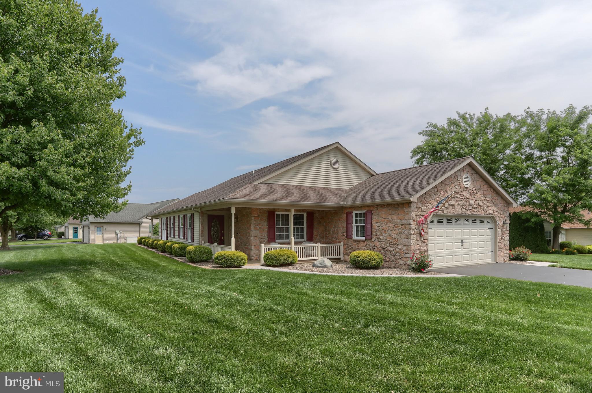 Welcome to 90 Arbor Drive located within the heart of Jackson Township in Arbor Gate 55+ Community.  Built in 2003, with 1,765 sq. ft. of thoughtfully laid-out space, this home features (3) bedrooms and (2) full bathrooms, including a primary bedroom with an en-suite and a spacious walk-in closet. Step inside to discover an open floor plan with living and dining areas, perfect for entertaining. Enjoy quiet evenings by the gas fireplace. Natural light floods the space with many windows in the main living areas, enhancing the warm ambiance. The kitchen is equipped with appliances, including a built-in microwave, dishwasher, and gas range, making meal preparation a delight.  Enjoy recessed lighting, under-cabinet lighting, updated granite countertops, and an attractive, timeless tile backsplash.  Be sure to notice the sun tubes in the laundry room and guest bath that provide natural light to both spaces. Your favorite spot just might be the 27 x 14 roof-covered back porch.  It's a beautiful place to rest, entertain, and gather with friends.  Outside, the well-maintained corner lot offers beautiful landscaping with low-maintenance stone landscaping beds and perfect-edge edging. Enjoy peace of mind with a large Generac generator.   This home has great curb appeal and is situated beautifully within the neighborhood.  ABOUT THE NEIGHBORHOOD: Arbor Gate boasts excellent neighborhood features: lovely, picturesque tree-lined streets, sidewalks, attractive front porches, and street lights ensuring a safe, tranquil environment. As a resident of the Arbor Gate 55+ community, you’ll have access to amenities such as the Lakeview Clubhouse with a fitness room, coffee shop, library, billiards room, game room, weekly clubs, and annual events, fostering a sense of connection and engagement. The monthly land lease for 90 Arbor Drive starts at $547.84 per month and includes: land taxes, on-site management, sewer, trash collection, bi-weekly recycling, access to Lakeview Clubhouse, common areas, and community lake. Schedule your tour today! Don’t miss this opportunity to enjoy a fulfilling 55+ active adult lifestyle in a welcoming community. Visit the neighborhood, take a walk, talk with the neighbors, and find out why so many have decided to call Arbor Gate home.