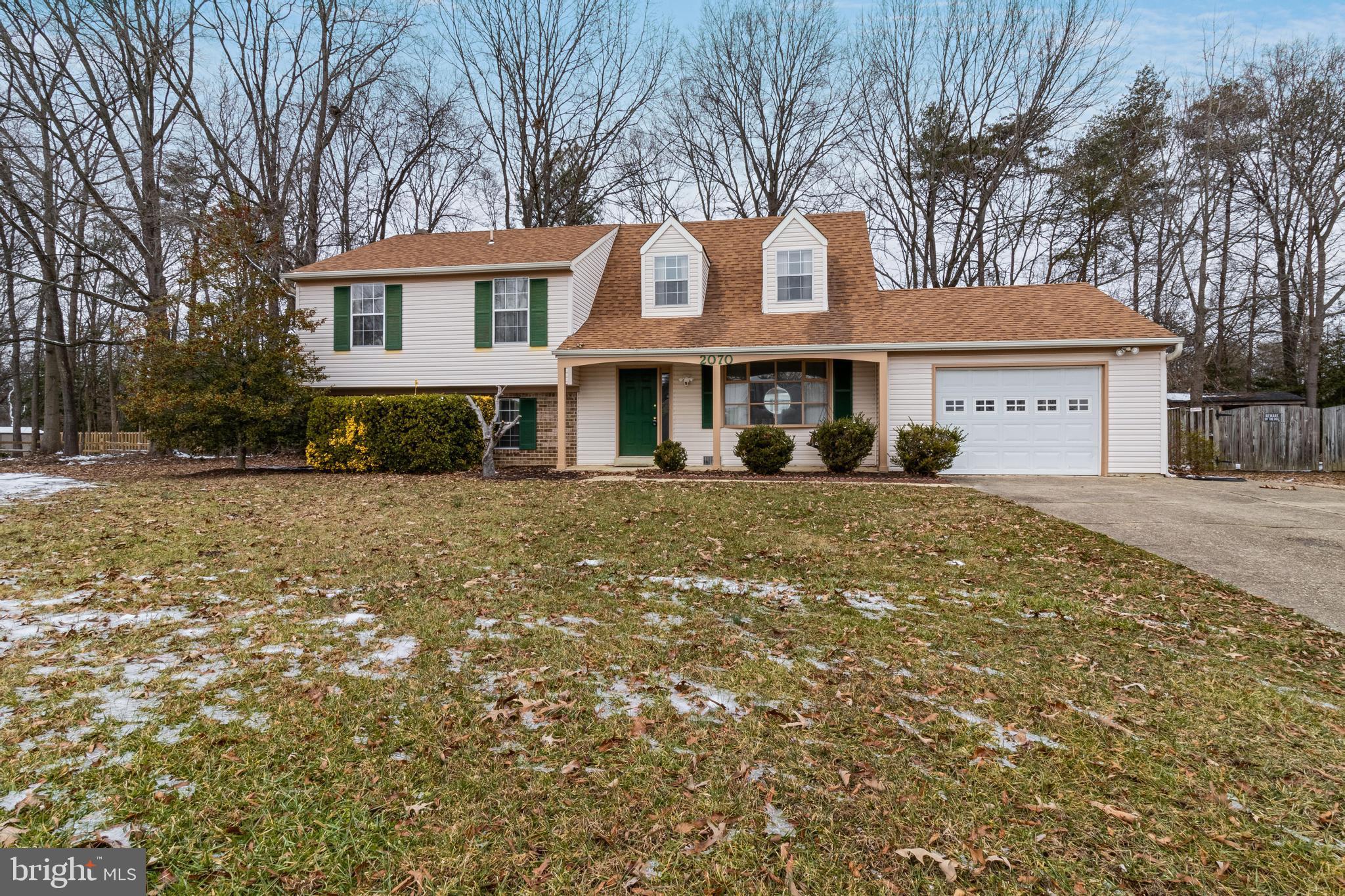 You will not believe all the space this home has to offer! This 4 bedroom, 2 bathroom Split Level home has been well cared for and is waiting for you to make it your own. Main level features a living room, dining area, kitchen. The lower level features a family room with fireplace, bathroom, and utility/laundry room. The first upper level features 3 bedrooms and a bathroom. The second upper level features a large bedroom or use as a recreational room.  The home features a 1 car garage with plenty of driveway parking and a flat ground back yard.