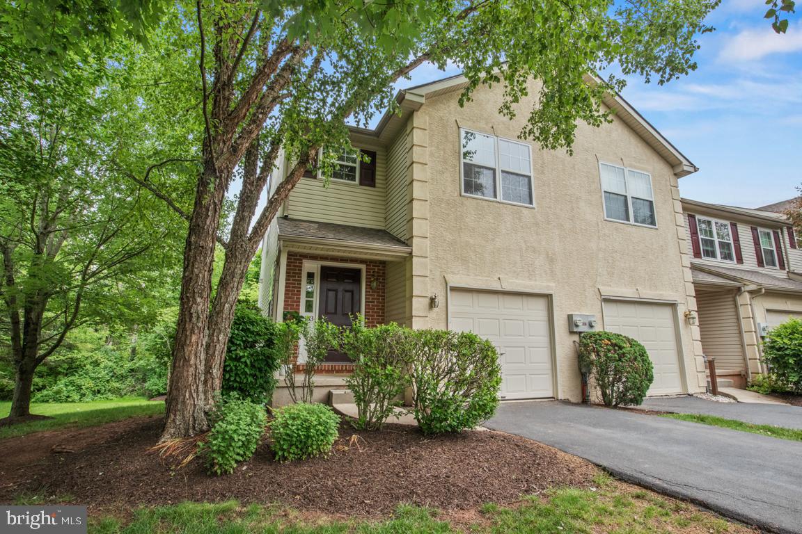 **SHOWINGS BEGIN AT OPEN HOUSE 5/30 12-2 ** Welcome home to 133 Vernon Court.  Nestled in Hatfield Township within the highly regarded North Penn School District, this beautifully maintained end-unit townhome offers the perfect blend of comfort, style, and privacy. Surrounded by open space and serene wooded views, this 3-bedroom, 2 full and 1 half bath home is truly move-in ready. The bright and inviting main living level features a spacious living room/dining room combination with a cozy gas fireplace and sliding glass doors leading to a private deck overlooking the trees — the perfect spot for morning coffee or evening relaxation. The gourmet kitchen is sure to impress with granite countertops, tile backsplash, ceramic tile flooring, and a 5-burner cooktop, all thoughtfully designed for both everyday living and entertaining. An updated powder room completes the main floor. Upstairs, you’ll find three generously sized bedrooms and two full baths, including a comfortable primary suite. The daylight walk-out basement provides exceptional additional living space with a large family room currently utilized as an office, plus a separate playroom/exercise room. Three storage closets offer outstanding organization and functionality.  Step outside to the patio and enjoy peaceful wooded views and the added bonus of open green space beside this premium end-unit location.
Major updates include a new roof in 2021 and HVAC system in 2022, providing peace of mind for years to come. A rare opportunity to enjoy low-maintenance living in a picturesque setting convenient to shopping, dining, parks, and major commuter routes.