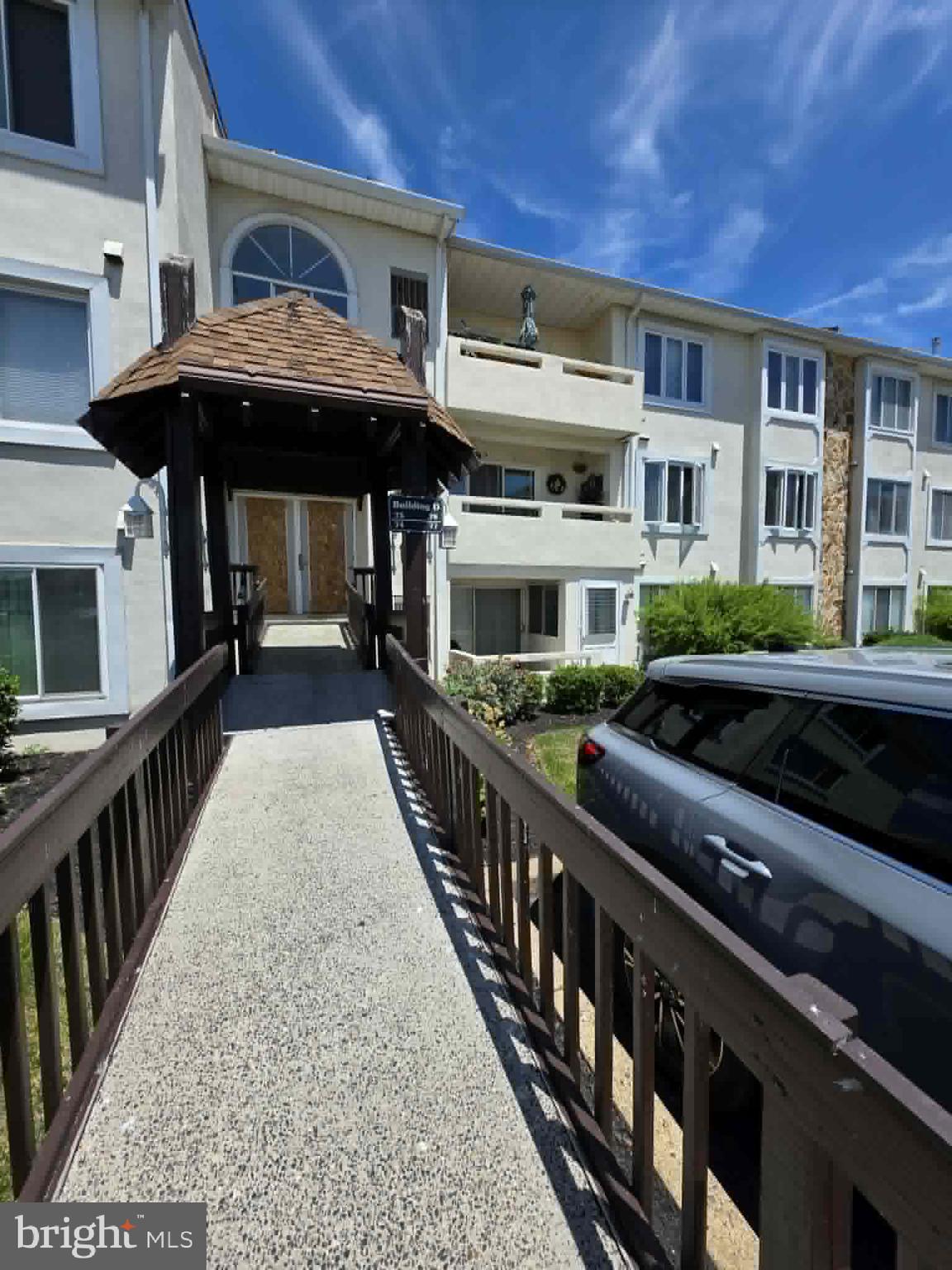 Welcome to 77 Bonnie Gellman Court, a beautifully updated and impeccably maintained second-floor condo located in the prestigious Fountain Pointe community of Northeast Philadelphia. This move-in-ready home offers a spacious and inviting layout featuring a bright living room with sliding doors leading to a private balcony. The fully renovated kitchen is equipped with elegant cabinetry, granite countertops, making it perfect for both everyday living and entertaining. A separate dining room with mirrored walls enhances the sense of space and natural light. The primary bedroom suite features abundant closet space and a private en-suite bathroom, while the generously sized second bedroom is served by a full hall bathroom. Additional highlights include in-unit laundry and ample organized storage throughout the home. The unit includes one deeded parking space and access to an outstanding selection of community amenities, including indoor and outdoor heated swimming pools, a fitness center, tennis courts, a library, and a community game room. Conveniently located near major highways including Route 1, I-95, and Welsh Road, the property is also within walking distance of shopping, dining, and recreation, including Giant Food Stores, LA Fitness, and local restaurants. Please note: Fountain Pointe is an owner-occupied community, and rentals are not permitted. Enjoy resort-style living in one of Northeast Philadelphia's most desirable condominium communities. Schedule your private tour today!