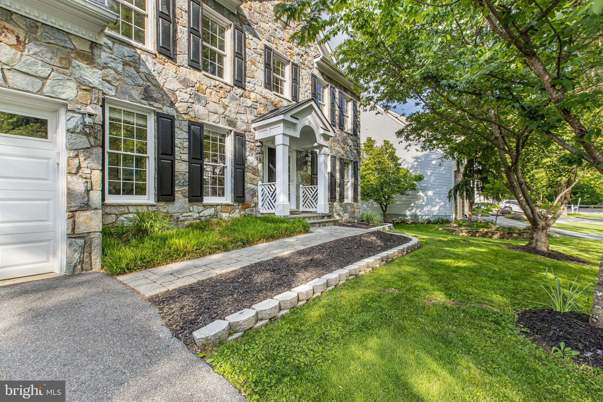 Back on the market at an improved price!!!

Welcome home to 2906 Boyds Cove Drive, a stunning stone-front Colonial nestled in the highly sought-after, upscale enclave of Boyds Ridge. This home offers over 3,800 square feet of elegant above-grade living space, perfectly blending sophisticated design with everyday comfort.

Step inside to an open flowing layout with gleaming hardwood floors, crown molding, and classic chair railings. The gourmet eat-in kitchen features granite countertops, cherry cabinetry, a gas cooktop, and a center island, flowing seamlessly into a breakfast nook and sunken family room anchored by a stone-front, wood burning fireplace, perfect for gathering with family and friends. A formal dining room rounds out the first floor, which also boasts an additional living room and library upon entrance to the house.

Upstairs, the luxurious primary suite serves as a true private retreat. It boasts soaring cathedral ceilings, a gas fireplace, and expansive his-and-hers walk-in closets. The en-suite spa bath features a relaxing soaking tub and double vanities. Three additional generously sized bedrooms complete the upper level.

The full walkout basement offers expansive unfinished space—a blank canvas ready to be transformed into a home theater, gym, or in-law suite. It already includes rough-in plumbing for a potential full bathroom, adding even more flexibility. Outside, enjoy a spacious rear deck overlooking a private lot, all tucked away on a quiet cul-de-sac.

Located just minutes from Historic Downtown Annapolis, the Parole town center, and major commuter routes, this home offers the ultimate combination of luxury, space, and convenience. Don't miss your opportunity to own in Boyds Cove!