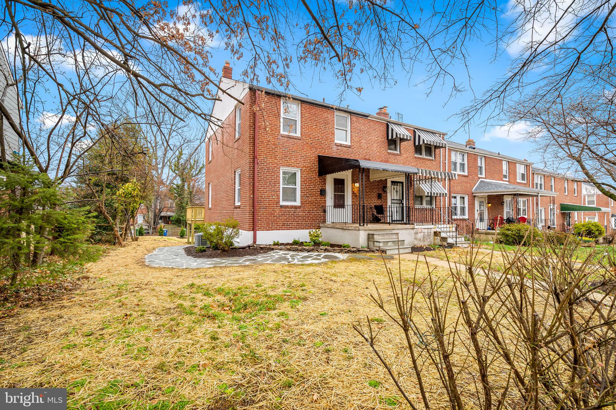 This fully renovated End-of-Group in Chinquapin Park sits on newly landscaped lot, uniquely large for the neighborhood! Inside, original oak hardwoods, refinished and brought back to life, lead through a newly opened first floor to a kitchen stunner: timeless white cabinets, understate herring bone backsplash and elegant veined countertops.  Upstairs, the classic three bedroom layout allows each room ample sun exposure and enjoyment of renovate bathroom, done with a timeless yet current sensibility. The lower level has become finished family room with a second full bath. Laundry and utility spaces add function to the finish and a walkout entry leads to the back patio that's shaded by the new deck off the kitchen. The backyard has been re-graded, seeded with mulched beds and a rear perimeter of young boxwoods. The hand-laid flagstone pathway leads past the front stacked-stone flower bed and joins the front walkway, all while enjoying the cover of the tree canopy.