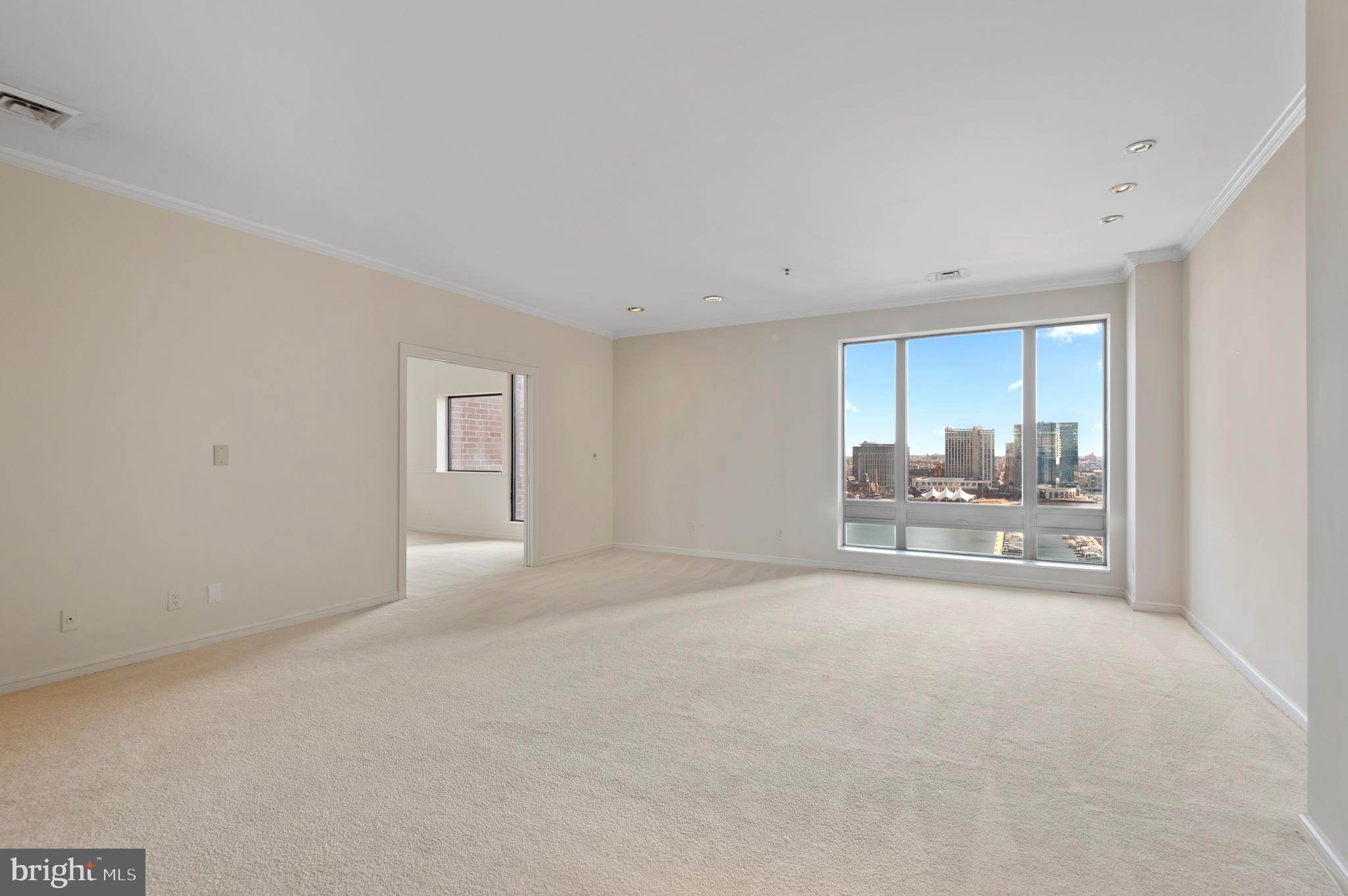 2 bedroom/2 bath condo with spectacular views of both sunrises over the Inner Harbor and panoramic sunsets over the park-like Otterbein neighborhood, Camden Yards, and M&T Stadium. Large living and dining areas give the perfect flow for entertaining. Large primary suite with bath and a generous custom walk-in closet. The 2nd bedroom/office also has an ensuite bath(& hall access) & spacious closets. The Royal Sonesta Harbor Court Hotel, connected to the Harbor Court condo building, gives direct indoor access and discounts for residents on food, gym (w/indoor pool), racquetball & tennis courts, and hotel rooms. The condo provides a doorman, 24-hr. front-desk service, 1 storage locker, and 1 parking space in the attached, gated garage. Superb location across the street from the waterfront promenade and the attractions of Baltimore's famous Inner Harbor. Close to restaurants, business district, shopping, stadiums, hospitals, and MARC train with service to DC.
