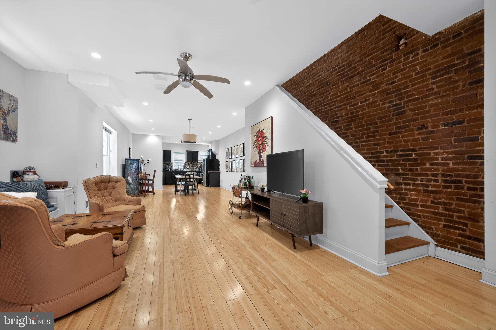 Welcome to 5010 Catharine St, a stunning 2,000 SQ FT West Philly Twin that perfectly balances 1920s charm with modern luxury. This semi-detached masonry home features a rare 3 BR, 2.5 BA layout, offering the space and convenience you’ve been searching for. Step from the classic covered front porch into a light-filled, open-concept main level boasting high ceilings, original hardwood floors, and a convenient powder room. The chef-inspired kitchen is designed for entertaining, featuring ample cabinetry and seamless flow to the rear yard.

Upstairs, find three generous bedrooms with excellent closet space and two full baths, including a primary retreat. MODERN COMFORT: Central A/C and Forced Air Gas Heat. The full basement provides massive potential for a home gym or workshop.

LOCATION IS EVERYTHING: Nestled on a quiet block just steps from the vibrant Baltimore Ave corridor, Cedar Park, and easy trolley access to University City/Penn/CHOP. Don't miss this West Philly gem!