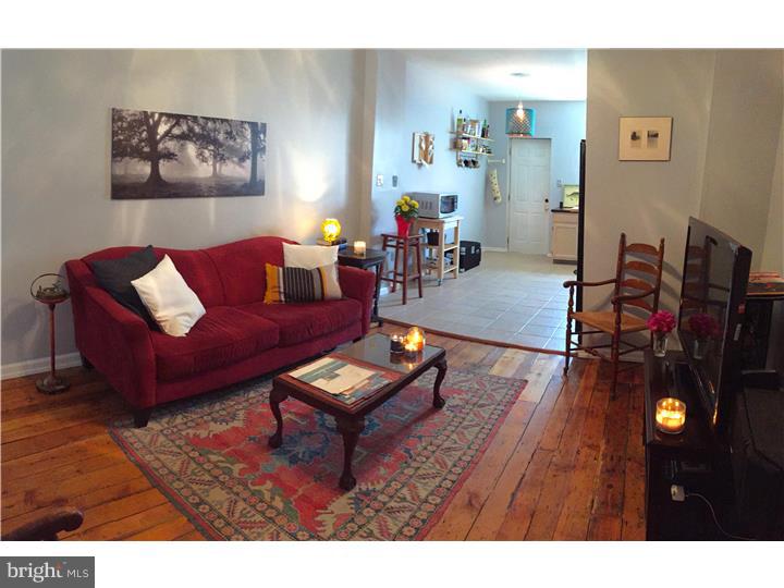 We welcome you to visit this charming 3 bedroom 1 bath Riverside Fishtown home located in walking distance to Fishtown's favorite cafe's, boutiques, restaurants, and entertainment spots. One of our favorite features in this home is the old world charm of the hardwood floors throughout, many of which are original recently refinished random width pine and in great condition! There is an inviting living room entrance with a tile floor landing and an open staircase allowing full expansive view of the house front to back! There is a formal dining room space large enough for entertaining and it is open to the kitchen. The eat-in kitchen is very large offering  plenty options to add a table or your choice of furnishings. The open floor plan on the first floor makes the house feels spacious. Solid wood cabinets and ample counter top space for those who love to cook. The gas range, dishwasher, and refrigerator are included. From the kitchen you can access a nice size rear yard with room for seating, a grill, a place for the dog to play, and even a garden for those of you with a green thumb. The 2nd floor has 3 bedrooms and an updated hall bath. The bathroom has been fitted with a lovely glass vessel sink on top of a storage vanity as well as a shower and bath combination with decorative accent tile work. The basement is fantastic for storage and the washer and dryer is included in the sale. And let's not forget this huge point... PARKING is incredibly easy on this semi private block. A rare bonus to find in an absolutely fantastic neighborhood!