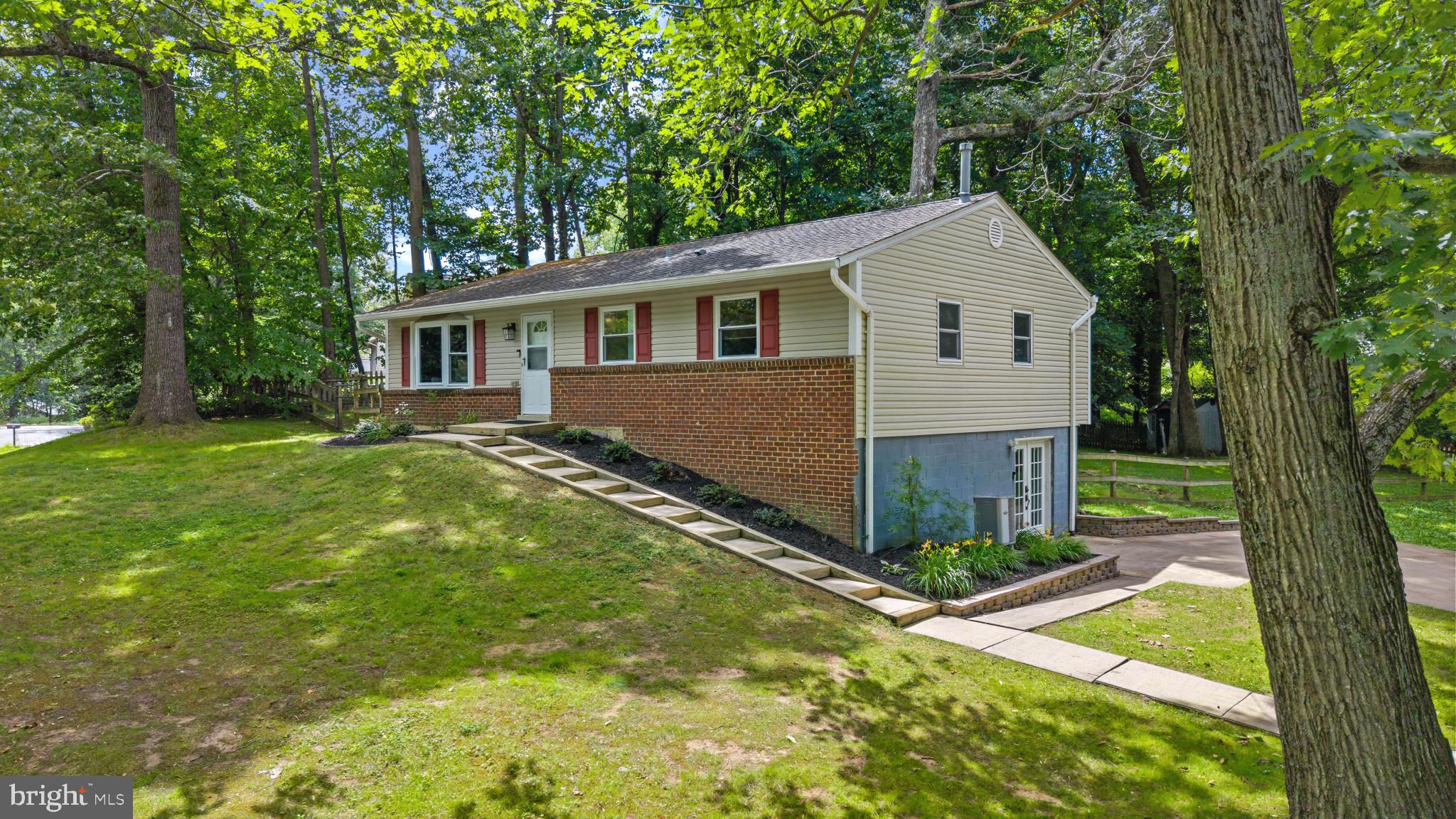 Welcome to 617 Wayward Drive in the highly sought-after Rolling Knolls community of Annapolis. Situated on a spacious corner lot, this well-maintained home offers exceptional outdoor space with a large driveway, fully fenced backyard, and two storage sheds providing ample room for hobbies, tools, and equipment.

Inside, you’ll find 3 generously sized bedrooms and 2 full bathrooms, including a beautifully renovated primary bath and updates to the hall bath. The bedrooms feature large closets, providing comfortable everyday living and abundant storage.

The heart of the home is the brand-new kitchen, thoughtfully designed with extensive cabinetry, abundant countertop space, and a bright eat-in area perfect for casual dining and entertaining.

The lower level offers incredible flexibility and untapped potential. A built-in bar with sink creates the perfect gathering space, while two separate finished rooms can easily accommodate a home gym, office, media room, playroom, guest space, or hobby area. One room features walk-out access to the driveway, bringing in natural light and enhancing functionality. A large utility room and oversized laundry area provide even more storage and workspace.

With its generous lot, extensive updates, versatile floor plan, and desirable Annapolis location, this home offers the perfect combination of comfort, convenience, and opportunity. Enjoy the convenience of nearby Rolling Knolls Elementary School, as well as easy access to shopping, dining, parks, and major commuter routes. Welcome Home!
