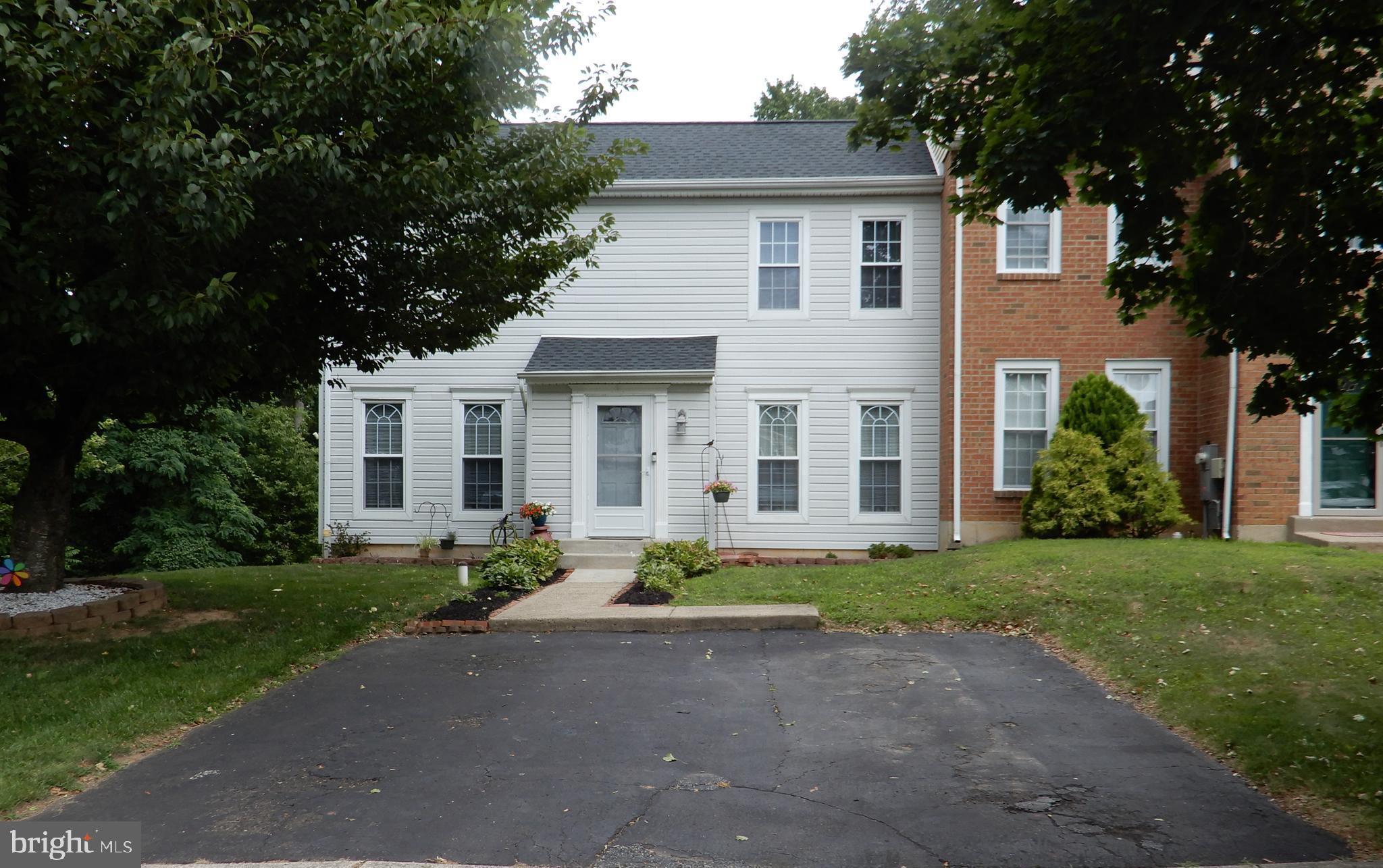 Welcome to this beautifully maintained end-unit townhouse tucked away on a quiet cul-de-sac in the desirable Neshaminy Valley community of Bensalem Township. Offering exceptional privacy and one of the neighborhood's most desirable settings, this home backs directly to wooded township open space and features the rare bonus of a finished walk-out basement.

From the moment you arrive, you'll appreciate the charming curb appeal, private 2 car driveway, mature landscaping, and inviting front entrance. Inside, the home offers 3 bedrooms, 2.5 bathrooms, and a spacious, thoughtfully updated floor plan designed for comfortable everyday living and entertaining.

The remodeled eat-in kitchen is the heart of the home, featuring granite countertops, a center island, stainless steel appliances, ceramic tile backsplash, recessed lighting, and plenty of cabinet and counter space. A ceramic tile foyer welcomes guests, while the adjoining living and dining areas provide an ideal space for gatherings.

The finished walk-out basement significantly expands the living space and opens directly to a peaceful backyard overlooking wooded township open space—a rare feature in Neshaminy Valley. Whether used as a family room, home office, playroom, or fitness area, this flexible space offers endless possibilities.

Additional improvements include a new heat pump (2020) and new roof (2022), providing added value and peace of mind.

Conveniently located near shopping, restaurants, parks, major highways, SEPTA, and I-95, this move-in-ready home combines modern updates, a premium location, and an exceptional setting that seldom becomes available.

Don't miss this rare opportunity to own one of Neshaminy Valley's most desirable end-unit townhomes!