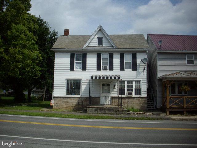 Multi Family 2 story home in the borough of Thompsontown!  Live in one & rent out the other!  2 bedroom apartment down & 2 bedroom apartment up!  Tenant occupied.  Replacement windows.  Electric baseboard heat in both units.  Tenants pay quarterly water/sewer bills.  Off street parking w/ detached garage.  Very nice rear yard.  Close to 322. Also in MLS as residential under #23548.