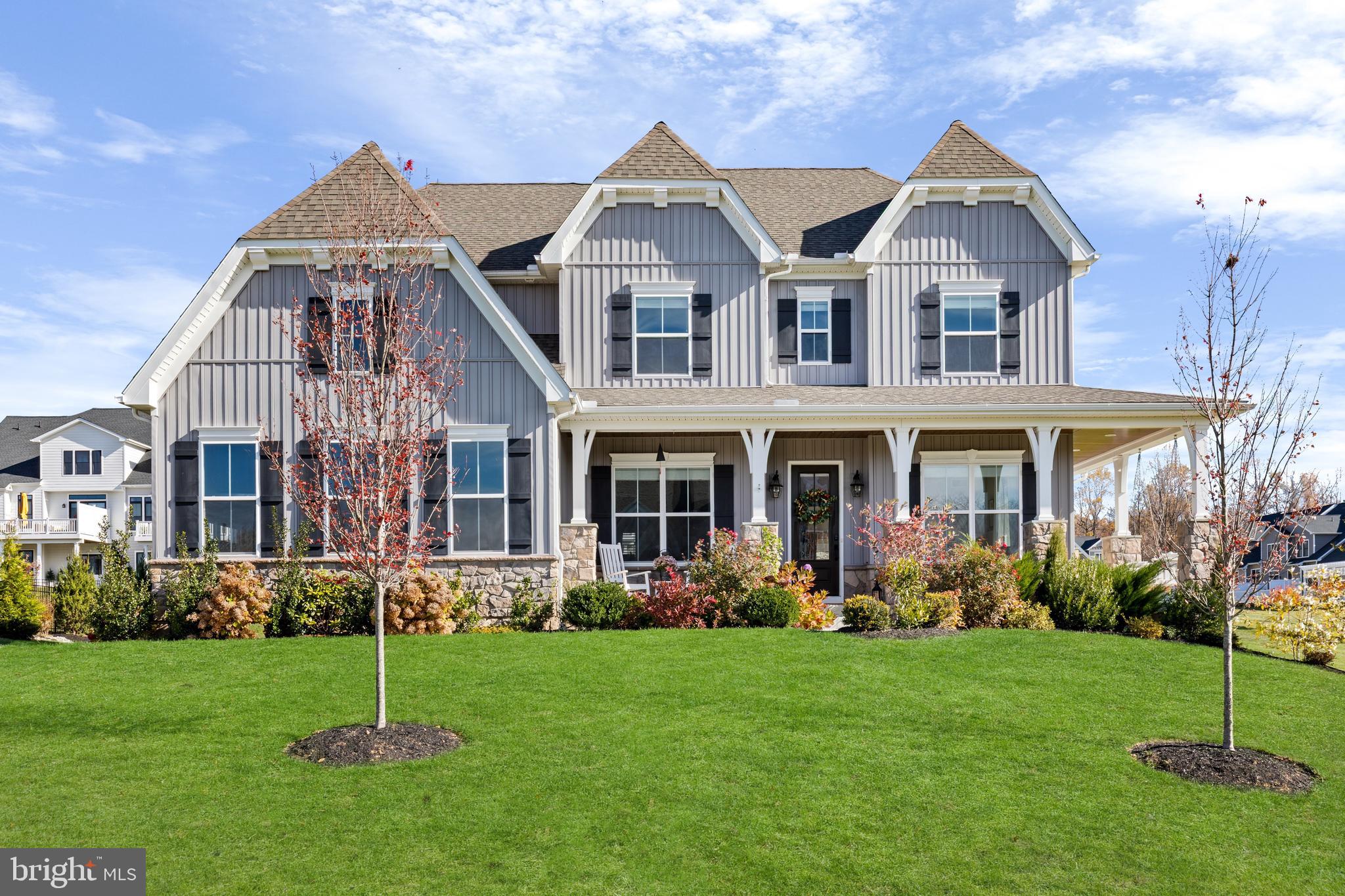 Welcome to 402 Barrows Sheef! Located in Ventry at Edgmont Preserve, this stunning custom-built modern farmhouse offers upgraded luxury living near to the Ventry clubhouse and pool, and is surrounded by the majestic Ridley Creek State Park with its seasonal displays of misty mornings and golden sunsets. Built in 2023 by Keystone Custom Homes, features include board and batten exteriors, hardwood sea salt oak flooring throughout, a farmhouse sink, a butler's pantry with beverage center, plantation shutters, 10-foot ceilings throughout, and abundant crown molding. Excellent airy natural lighting throughout the day, and comfortable living spaces. Custom wainscoting and a grand main staircase add traditional charm to this new home. The two-story family room is perfect for gathering, marked by an impressive floor-to-ceiling everglades stacked stone gas fireplace. The gourmet wall-to-wall chef’s kitchen has flowing counters and cabinet banks. The kitchen is equipped with quartz countertops, a jumbo island, and seating area with a vaulted ceiling. The kitchen is perfect for your daily routine, as well as entertaining. Jennair gas range with vented and lighted hood, oven, dishwasher, and microwave. Fisher & Paykel four-door refrigerator. Soft-close drawers throughout the kitchen and bathrooms. Excellent interior recessed lighting. USB-port outlets provided throughout the kitchen. A large finished basement provides for expansive living space. Basement includes half-bath, separate storage space, convenient utilities access, and a large egress window with natural lighting. Dual zone Goodman HVAC. On-demand Navien tankless hot water heating system. Indoor safety sprinkler system and dual carbon monoxide/smoke detectors throughout the entire house. Second floor dedicated laundry room with pedestal front-load Whirlpool washer and dryer units. Custom-finished screened porch and deck with timbertech boards, recessed ceiling and farmhouse lighting. Wrap-around front porch perfect to enjoy your morning coffee. Acadia field stone exterior trim. Custom landscaping, including magnolia, evergreen, and maple species. Accessible trails, scenic pond, and creek fishing. Top-ranked schools. Ellis Preserve shopping, restaurants, and entertainment at Newtown Square. World-class golf. Excellent location for access to the Main Line, center city Philadelphia, PHL International Airport, and Amtrak to New York (Paoli Station). Welcome to your new home!