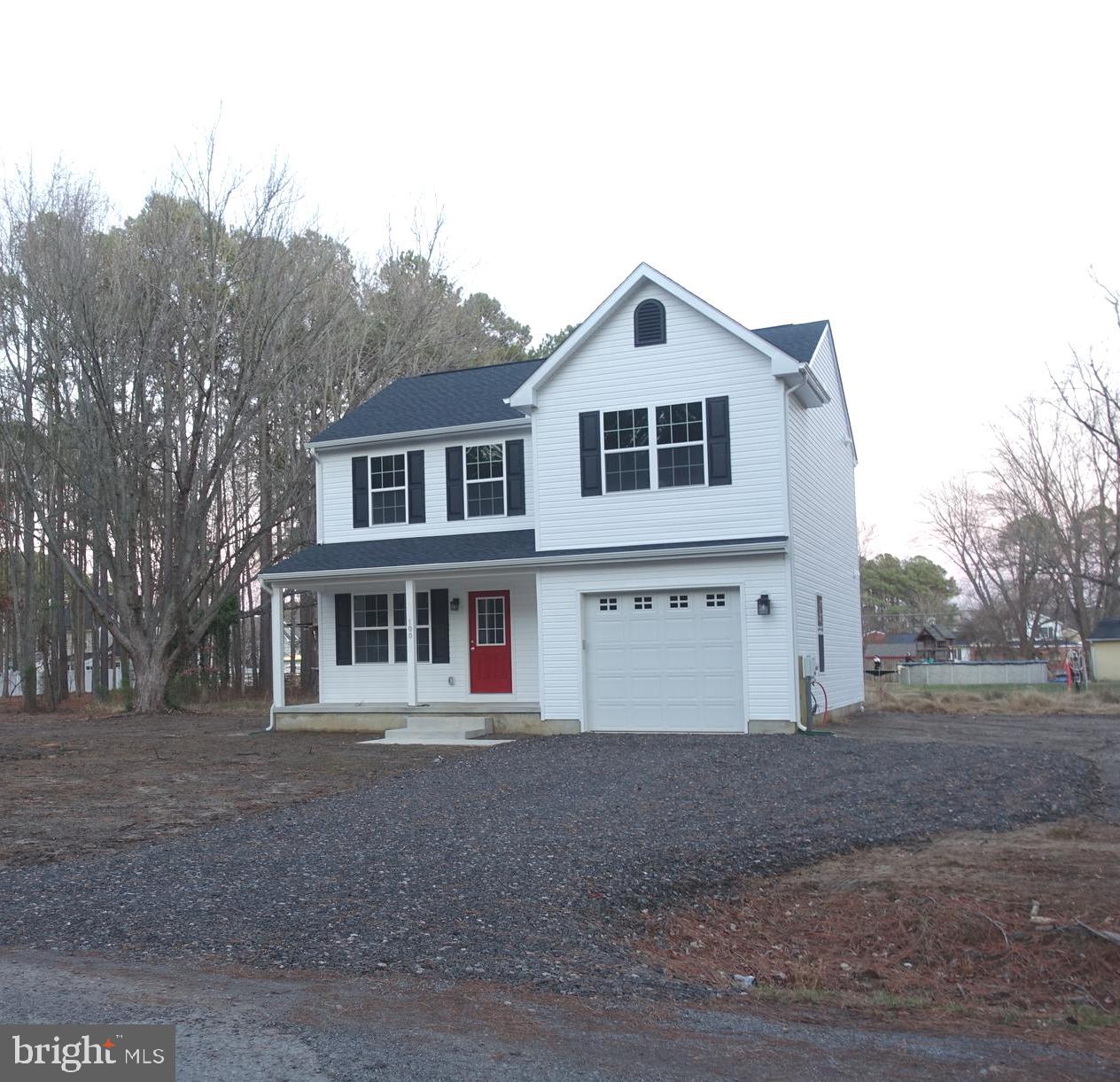 Brand new and ready for you! This beautiful home in Kent Island Estates offers modern living at its finest.  The spacious layout boasts an open-concept main level, perfect for today's lifestyle.  The kitchen is a chef's delight, featuring granite countertops, stainless steel appliances, soft-close cabinets, and a large breakfast bar.  Luxury vinyl plank flooring flows throughout the main living areas, while plush carpeting adds comfort to the bedrooms.  The owner's suite is a true retreat, with a walk-in closet, two additional closets, and a private bath with a generous stall shower.  Two additional bedrooms, a full bath, and a conveniently located laundry room complete the upper level.  Enjoy outdoor living on the covered front porch and appreciate the extra driveway, ideal for boat or RV parking.  Benefit from well water and public sewer.  Located in the sought-after Queen Anne's County school district, with a quick commute to the Bay Bridge.  Don't miss this opportunity – schedule your showing today!