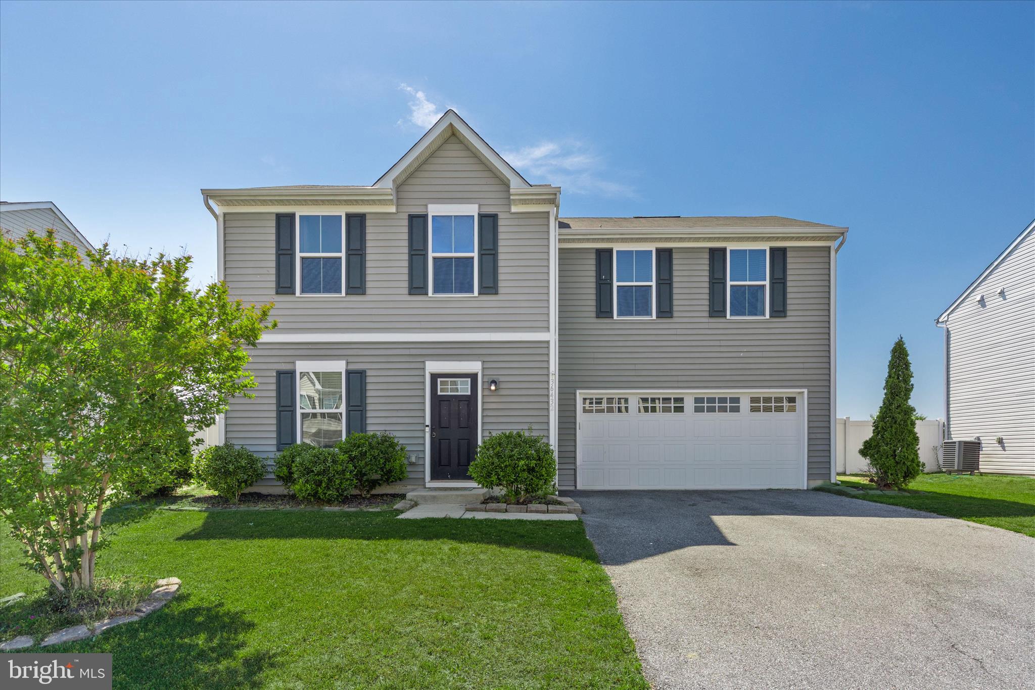 Welcome home to this beautifully designed 3-bedroom, 2.5-bath residence offering a fantastic floor plan, bright open spaces, and a peaceful setting with pond views. The main level features an inviting open-concept layout ideal for everyday living and entertaining, complete with a spacious living room, dining area, and a large, functional kitchen outfitted with stainless steel appliances, ample cabinetry, and plenty of workspace. Warm-toned luxury vinyl plank flooring, recessed lighting, and abundant natural light create a stylish and welcoming atmosphere throughout the main living area. A convenient half bath and interior access to the attached two-car garage add to the home’s thoughtful design. Sliding glass doors lead to a patio and a large fully fenced backyard overlooking the community pond, providing the perfect outdoor space for relaxing, entertaining, or simply enjoying the tranquil water views. A storage shed adds even more functionality with convenient space for lawn equipment, tools, or seasonal storage. Upstairs, the spacious primary suite features a private ensuite bath, creating a comfortable retreat at the end of the day. Two additional bedrooms and another full bath provide plenty of space for family or guests. Adding to the home’s convenience is the generously sized upper-level laundry room, and large linen closet making daily living even easier. Combining functionality, attractive finishes, and beautiful indoor and outdoor living spaces, this home is the perfect blend of practicality and modern comfort. Located in the desirable Yorkshire Estates community in Delmar, this home is just minutes from grocery shopping, restaurants, everyday conveniences, and major commuter routes, offering both comfort and convenience in an ideal location.