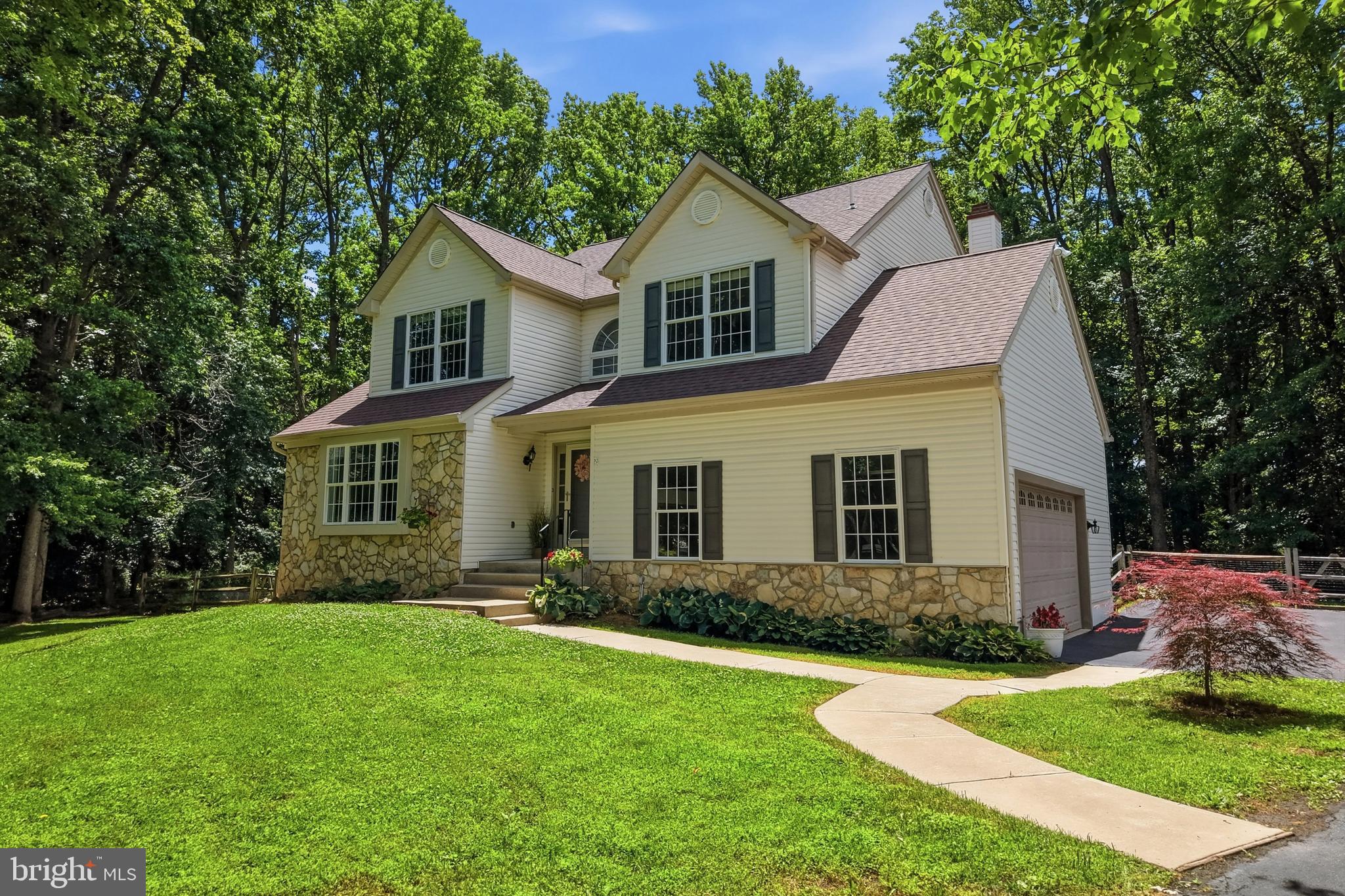 Welcome to Greenbriar, one of Garnet Valley's most desirable neighborhoods, located within the award winning Garnet Valley School District. Nestled in a mature community known for its privacy and strong sense of community, this custom built home offers 4 spacious bedrooms, 3 full bathrooms, 1 half bathroom, and an abundance of living space designed for everyday comfort and entertaining.

Step inside to a grand two story foyer with hardwood flooring and a beautiful custom staircase. The formal living and dining rooms are filled with natural light, while the spacious kitchen features ample cabinetry, a pantry, breakfast bar, desk area, and overlooks the cozy family room with a gas fireplace. An additional flex space off the kitchen provides endless possibilities for a playroom, home office, sitting area, or breakfast nook. Enjoy the changing seasons from the bright three season room, complete with large windows and access to the rear deck.

Upstairs, all four bedrooms are generously sized, including the impressive primary suite featuring double door entry, a dressing area, walk in closet, additional closet space, double vanity, and a large soaking tub. The massive, finished basement adds even more living space with a gas fireplace, full bathroom, ample storage, and an additional finished room with a closet that can adapt to your lifestyle needs.

Outside, you'll find a spacious backyard, large deck, and an oversized driveway that makes hosting guests a breeze. Additional highlights include main floor laundry, abundant storage throughout, a freshly painted garage, HVAC replaced in 2019, and a water heater installed in 2025.

If you're ready to enjoy the Garnet Valley lifestyle, this exceptional Greenbriar home is ready to welcome you. Stop by the open house on Wednesday, 6/17 to see this lovely home for yourself!