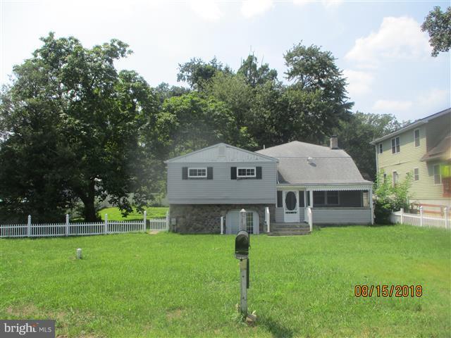 Spacious 4 Level Split offers 4 bedrooms & 3 baths. Open floor plan on main level features hardwood floors in Living & Dining rooms. Kitchen has lots of cabinet space.Upper level 1 has 3 bedrooms & bath. Upper level 2 has huge master & bath with separate shower & tub. Lower level has family room & full bath.Huge fenced rear yard with screened in gazebo. View docs OPENS TO INVESTORS 9.6