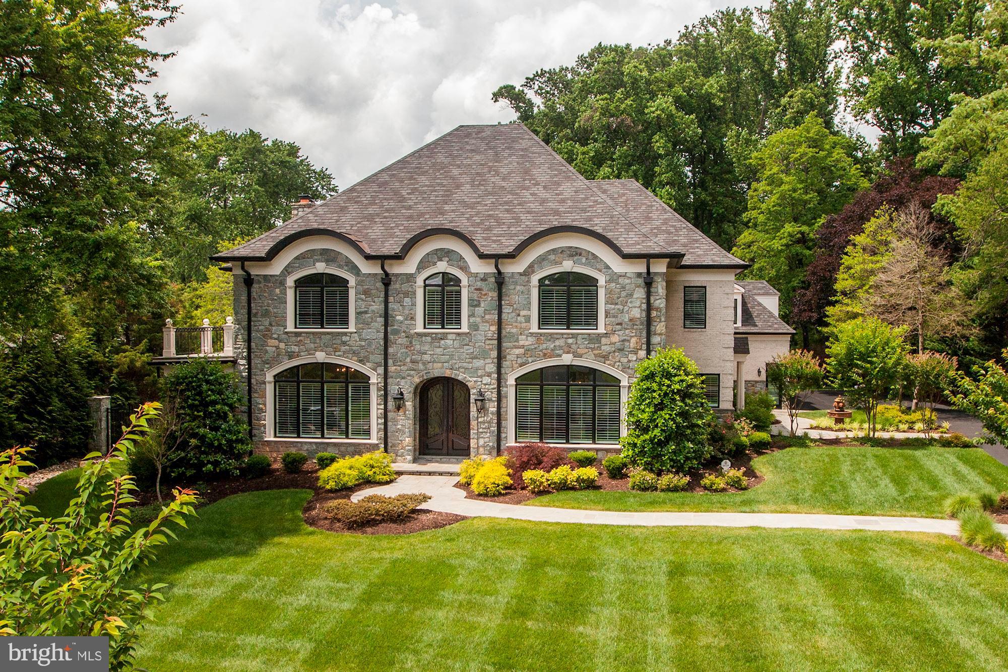 Truly beautiful 4 year old custom built colonial on an absolutely beautifully landscaped & very private lot with room for a pool   No expense was spared in the finishes and designer appointments with rich moldings throughout   Over 9200 sf of luxury living including an in law suite over the garage with a private entrance   Elevator Ready   Two covered porches & an expansive stone terrace wrapped around the side and back of the house that is partially covered and has a decorative water fountain   Ten foot ceilings on main level and high end hardwood flooring on all three levels   Luxury owners suite with a stone balcony and sitting room with wet bar & gas fireplace    5 foot oak gallery staircase with decorative spindles to upper and lower levels   Second terrace that connects the upper level to the bonus room over the garage   Two stone fireplaces   Stone wall & pillars at driveway entrance   Whole house generator   Four car garage with electric car super-charger and overhead storage   Plantation shutters on the main & upper levels   Hardwired stereo speakers   Back-up electric sump pump    Black 6 ft metal fence surrounding property   Expanded irrigation system   Viking appliances and Subzero refrigerator   Four heating and cooling zones   Built-in book cases and family room and master bedroom   Window seat with built-in book shelves in two bedrooms   Utility sinks in both the garage and basement utility rooms   Large decorative double entry metal front doorWoodhaven is a friendly place to live with homes on large treed lots and is located just 2 miles from the Silver Line Metro   The neighborhood is highly sought after for its access to top ranked schools, Tysons business center and the short commute on the Toll Road to Dulles International Airport and the Tech Corridor   Scotts Run Nature Preserve and Great Falls Park are just minutes away for hiking and nature walks along the Potomac River   Residents can walk or bike to Spring Hill Recreation Center, sports fields and the Hamlet Swim and Tennis Club