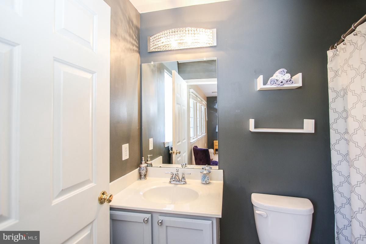Spacious brick front townhome in Frederick! Features 3BR with 2 Full and 2 half baths. Open concept ML w/ hardwood floors, gas FP, and large FR w/ vaulted ceiling. Eat-in kitchen w/ granite counters, large island, and lots of storage. MBR w/ walk-in closet and ensuite bath. Fully finished LL half bath, potential BR, storage, and lots of rec space. Minutes to I270, shops and restaurants. Must see!