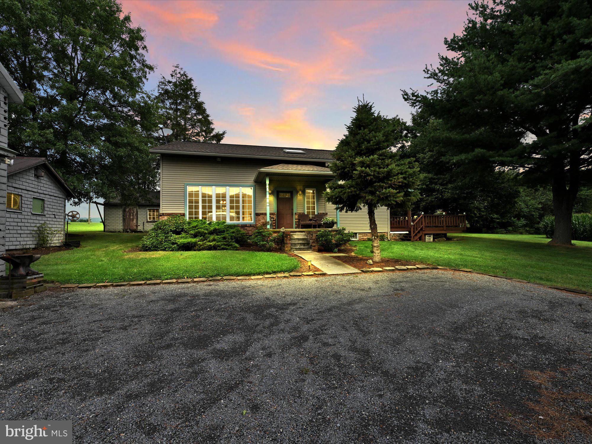 Peace, Tranquility, Privacy! That's what you'll have with this well-maintained 3 bed, 1 bath home.  Through the front door you'll find the spacious Foyer with skylight, large Eat-In Kitchen with plenty of cabinet space, all appliances, and sliding doors leading to the deck; Office w/built-in storage, very clean Living Room with bonus attached Sun Room featuring passive solar heating.  Head to the second floor to find the spacious Master Bedroom with hardwood flooring and built-in shelving, well-lit Bathroom, Loft, as well as 2 additional Bedrooms (one is a walkthrough).  Yellow pine tongue and groove flooring underneath carpet, etc.  Surrounded completely by nature and farmland, this is the definition of country living.  Sit on the front porch for your morning coffee and kick back and finish your day on the 376 sq ft Deck.  Perfect views from almost any angle.  Well-manicured, partially fenced-in yard.  Four separate machine sheds are perfect for all of your toys, tools, and plenty of workshop space for the handyman.  Plenty of parking for gatherings or entertaining.  Full Basement with concrete floors and interior/exterior access.  Coal heat with oil option, Andersen vinyl replacement windows, well water, and on-site septic.  Very low taxes make this home even more desirable than it already is!  The property is accessed via private lane with deeded right-of-way.  Please do not enter the lane unless you have a scheduled appointment due to children that play near the end of the lane.  Tri-Valley Schools.  Showings start 10/3- Schedule today to reserve your spot! Please have preapproval prior to scheduling showing.