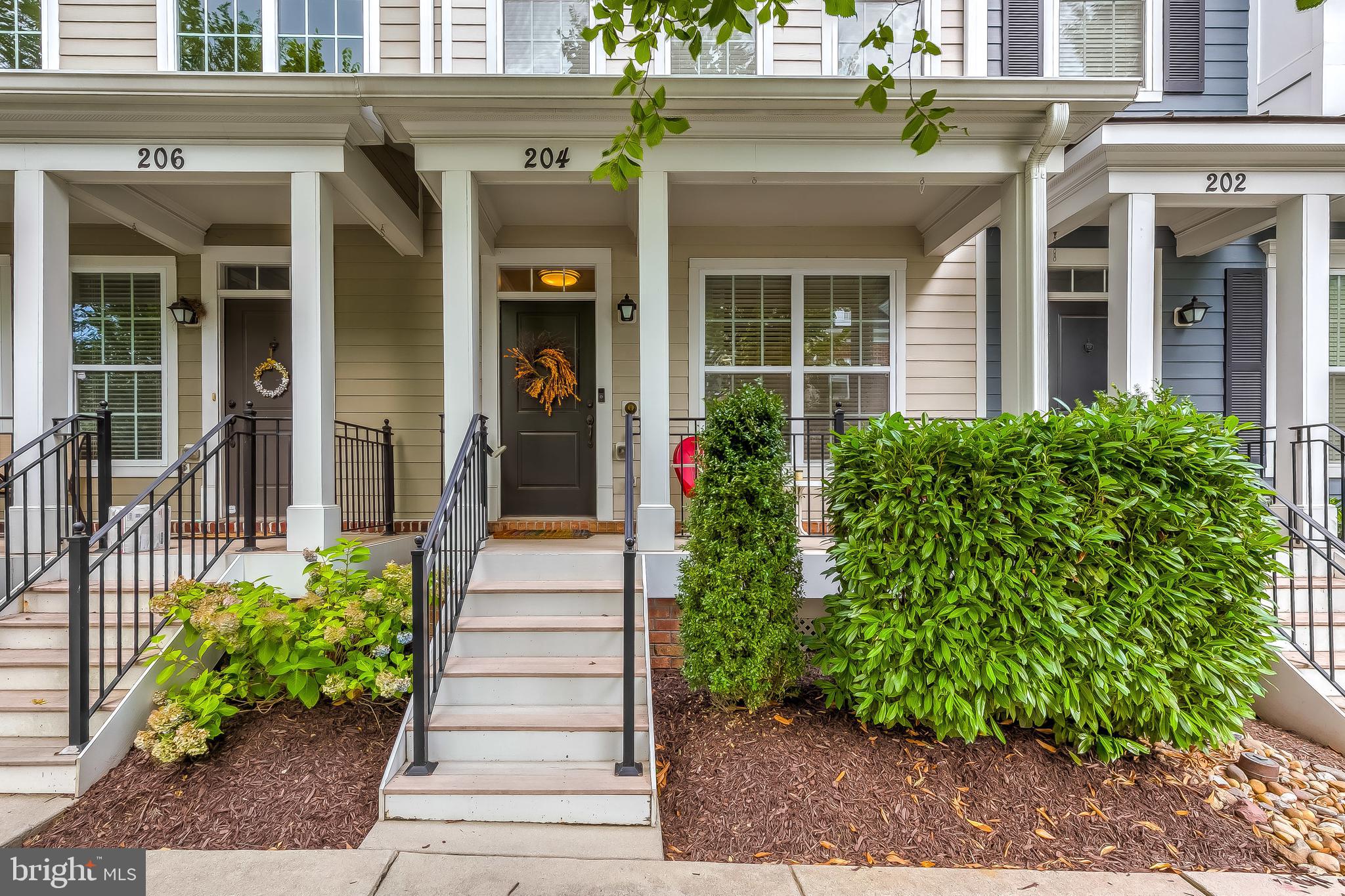 METICULOUSLY MAINTAINED FORMER COMMUNITY MODEL HOME W/ 4 FINISHED LEVELS  OF UPGRADED STYLE & SPACE - located just steps to downtown Towson this former Bozutto Homes model offers the most discerning buyer all the available luxuries and amenities in Towson Green including recently added home office at ground level with custom built-in cabinetry, granite counter tops, under cabinet lighting and convenient half bath leading to a temperature controlled 1 car garage.  The  home features hardwood floors and crown molding throughout, designer kitchen with ss appliances, quartz counter tops and tile back splash with private rear deck off kitchen, separate dining room and light filled large living room.  Upper levels provide two bedrooms suites with luxurious baths, dual sinks in owner suite, walk-in closet, convenient hallway laundry and top level bedroom/club room complete with brand new full bath and wet bar leading to your roof top deck great for entertaining!  Remainder of 10 year tax credit exists on this home saving the buyer 50% annually on property taxes - tons of upgrades added & great location w/ easy street parking in front of home make it the best home available in the community, come take a look!