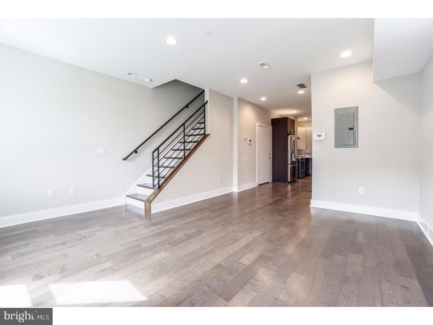 Welcome to 2512 Frankford Ave!  Four spectacular Bi-Level Condos completely renovated throughout.  Unit "B" Main Level features an open floor plan with large Living/Dining area, contemporary Kitchen with quartz countertop, marble tile backsplash, five burner slide-in gas range, counter depth refrigerator, and hidden control dishwasher. Ultra modern ceramic hall bath with tub, and one piece toilet.  Third floor contains two bedrooms,laundry closet, and an awesome ceramic bath with stall shower. Huge roof top deck with wonderful city views.  Tax abatement approved. Great location! 94 Walk Score. Convenient to Philadelphia Brewing Co, Martha, Memphis Taproom, Pizza Brain, and much more! Easy to show!