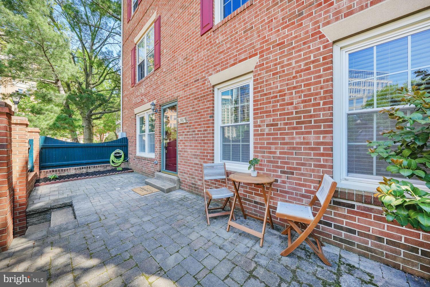 Offers will be reviewed Tuesday at noon. Welcome to this beautifully updated 2-bedroom, 2-bath condo that lives like a home, complete with your very own private terrace. Ideally located just four blocks from the Ballston Metro, this residence offers the perfect blend of comfort, style, and convenience.

Step inside to rich dark hardwood floors that lead you into a spacious living room anchored by a cozy wood-burning fireplace. A separate dining area offers the perfect setting for entertaining or everyday meals. The kitchen has stainless steel appliances, elegant cabinetry, and warm brown Corian countertops.

The spacious owner’s suite features brand new carpet, two generous closets, and a private en-suite bath. The second bedroom also has new carpet, two closets, and easy access to the second full bathroom, conveniently located just outside in the hallway. You’ll also love the full-sized laundry room with side-by-side washer and dryer—an uncommon perk in condo living.

Step out onto your private terrace to unwind or entertain with views overlooking vibrant Ballston. One assigned parking space (#2) is included.

With low condo fees, a quiet, homey feel, and none of the usual condo hassles, this is truly a hidden gem. Just two blocks from Ballston Quarter, across the street from Target and Total Wine, and moments to everything Arlington has to offer—this location is A+.