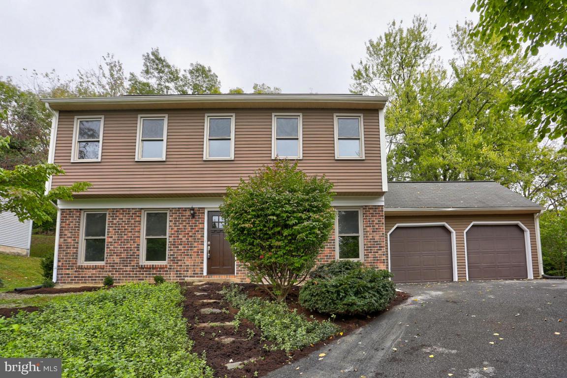 New kitchen with soft-close drawers, granite tops & Stainless steel appliances. New baths, new flooring and paint throughout. huge family room with vaulted ceiling & fireplace.