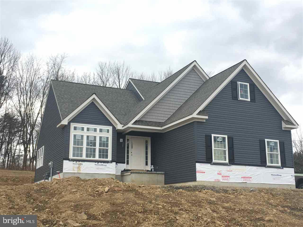 Currently under construction; home features first floor master, open floor plan, sideload garage, upgraded kitchen cabinets with granite, hardwood throughout first level.
