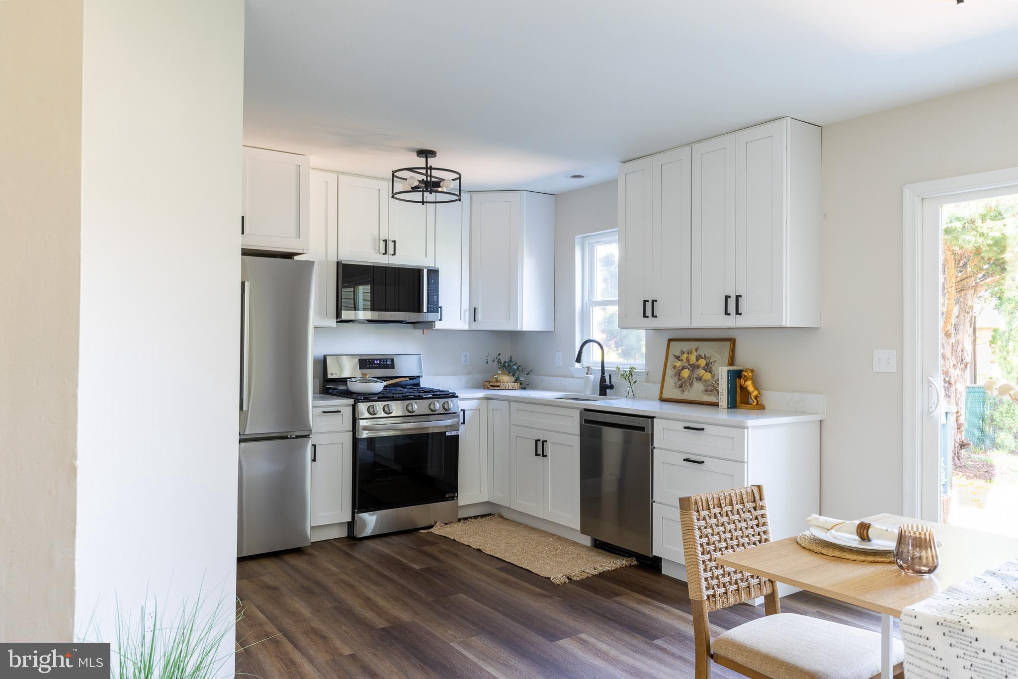 Welcome home to this beautifully renovated 3-bedroom, 1.5-bath townhome in New Oxford! This move-in ready home features a brand-new kitchen complete with new cabinets, countertops, and appliances, along with fresh paint and new flooring throughout the entire home. Both bathrooms have been fully updated, offering a clean and modern feel. The partially finished basement provides flexible space perfect for a playroom, additional living area, or home office, while the unfinished section offers plenty of storage. New A/C.
