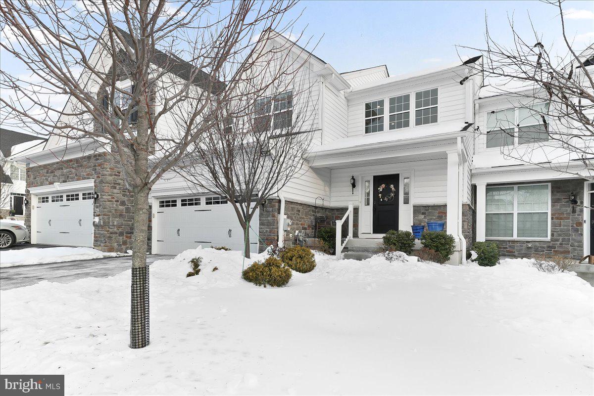 Welcome to 3718 Parris Boulevard, an exceptional and expanded Strathmere model luxury carriage home built by Toll Brothers in 2020, gracefully situated in the highly sought-after Enclave at Ellis Preserve in Newtown Square. Thoughtfully upgraded and impeccably maintained, this sophisticated residence offers refined design, elevated finishes, and effortless elegance throughout. A dramatic two-story foyer with dual coat closets sets the tone for the home’s upscale aesthetic. Wide-plank hardwood flooring flows seamlessly across most of the main level and loft, enhancing the open, airy ambiance. The formal living and dining areas offer timeless elegance, ideal for entertaining. The expanded main-level primary suite is a serene retreat, featuring a generously sized bedroom, dual custom walk-in closets, and a spa-inspired bath complete with dual vanities, a private water closet, and a frameless glass shower with built-in bench seating—designed for relaxation. This residence offers 3 bedrooms, a spacious loft, 3 full and 1 half baths, and a beautifully finished lower level. A four-foot rear extension—beyond the standard model—creates an impressive great room highlighted by a soaring vaulted ceiling and a wall of windows that flood the space with natural light. At the heart of the home lies a true gourmet kitchen, appointed with upgraded stainless-steel appliances, a six-burner gas cooktop with professional hood, wall oven and microwave combination, soft-close Century cabinetry, quartz countertops, designer tile backsplash, and an expanded island ideal for entertaining. The adjacent oversized, low-maintenance deck enjoys abundant sunlight perfect for outdoor dining or cultivating a garden oasis. Additional main-level features include a well-appointed laundry room with utility sink, an elegant powder room, and convenient interior access from the two-car garage. An oak turned staircase with decorative iron balusters leads to the upper level, where a spacious open loft provides the perfect setting for a home office, library, or lounge. Two generously sized bedrooms with ample closet space share a beautifully appointed bath with tiled tub/shower combination and linen closet, offering both en-suite and hall access functionality. The finished lower-level offers over an open floor plan with nearly an additional 1,400 sq. ft. finished  area plus a utility / storage room. The lower level has high ceilings and expands your living space even further offering exceptional flexibility for a home gym, guest suite, media room, and office. An amazing full bath with walk-in shower and a storage/utility area complete this level. Nestled within the vibrant Ellis Preserve community, residents enjoy picturesque trails and sidewalks leading to the Town Center at Ellis Preserve, home to Whole Foods, Ruth’s Chris Steak House, Sedona Taphouse, La Colombe, Paris Baguette, Kilwins Ice Cream, Napa, and more. Ideally located with convenient access to Philadelphia International Airport, Paoli and Bryn Mawr train stations, and just minutes from the Main Line, West Chester, King of Prussia, and Media. Buyers to verify square footage of home. This turnkey residence offers the elegance of new construction with the added value of thoughtful upgrades and premium enhancements throughout. This is luxury living at its finest—and the home you’ve been waiting for.