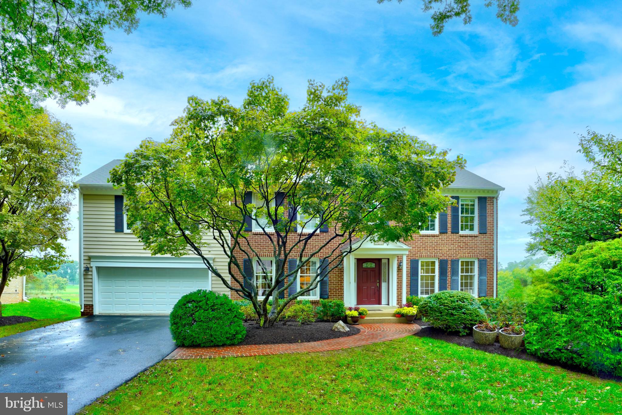 Twice expanded center hall colonial backing up to the golf course!  Welcome to 988 Farm Haven Drive, the grand dame of North Farm!   This stunning home offers a  blend of elegance, comfort, and exquisite views.  Culinary enthusiasts will delight in this enormous chef’s kitchen, featuring a custom refrigerator, double oven and gas cooktop with ceiling-height cabinets and an abundance of counter space.  With floor to ceiling windows and doors, doing just about anything in this room is awe inspiring.  Adjacent to the kitchen, the sun-drenched dining room, with its palladium windows, provides serene outdoor views . Seating for 12-14 and seamless flow into the living room makes this house ideal for entertaining.   Also off the kitchen is the cozy family room with a wood burning fireplace.   This  room could be further opened up to the kitchen for that open concept vibe!
 Ascending the staircase, one immediately  notes the long hallway to the palatial primary suite.  Cathedral ceiling, ensuite office/work out room, 5 large closets, upstairs washer and dryer are just a few of the attributes. Three sides of windows bathe this space in light!   Large spa like bathroom with two sinks, a soaking tub and a steam shower makes one think of true pampering!    This truly is an owner's oasis.  Four other bedrooms and  two more full baths complete this floor.  

The  extended lower floor has endless possibilities.  Two large spaces with a walkout to the level back yard could be an in-law suite or just another place to hang out with family and friends.  Sixth bedroom and fourth full bath complete this level. 

The outside of this house is just as beautiful as the inside!  Large private deck with views of a golf course and lake!   If it starts raining, just go relax in the adjacent  screened in porch! The level yard boasts a professional garden with perennial plants that never fail to give a pop of color with every season!  Welcome Home!