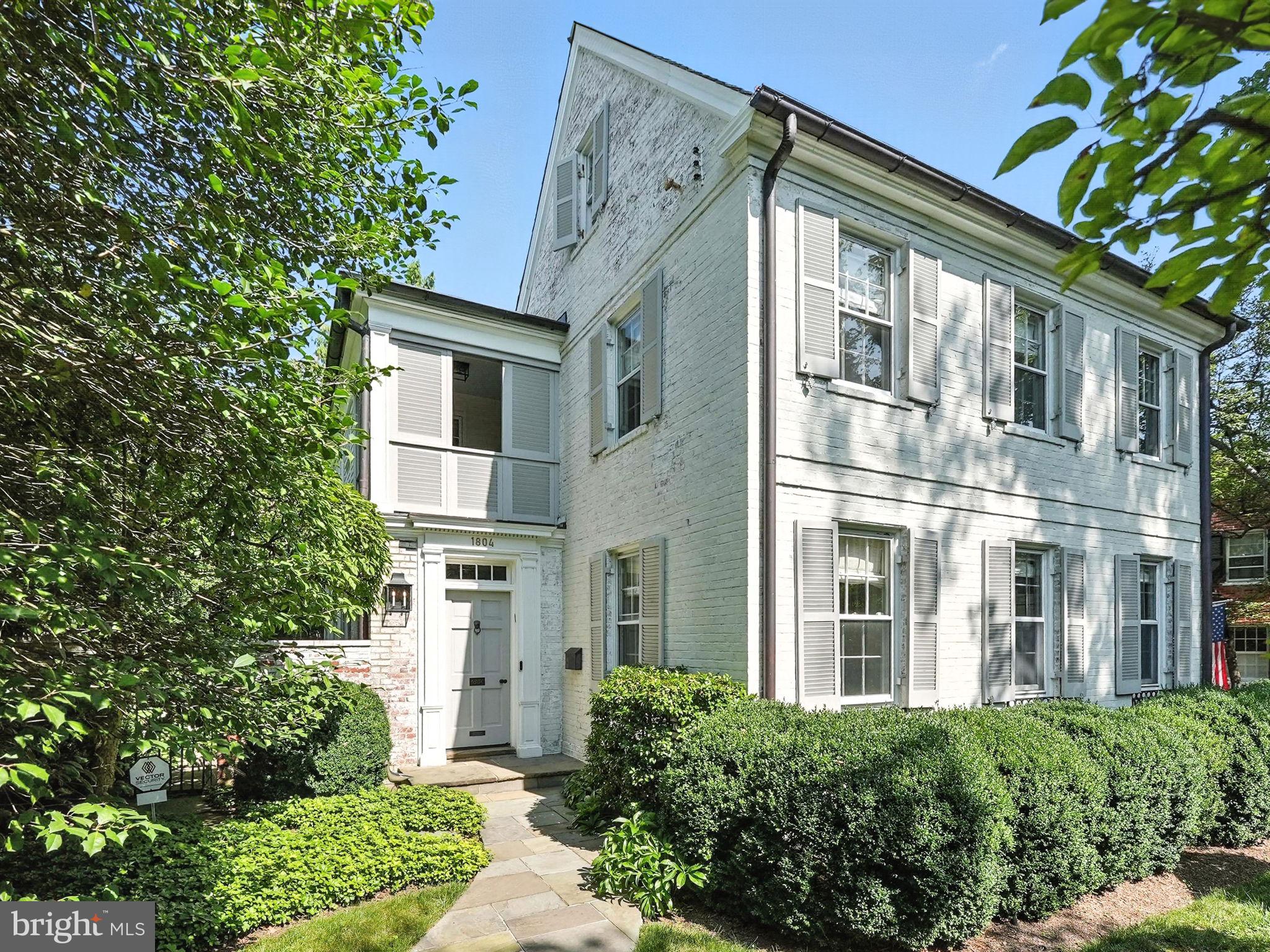 Welcome to this exquisitely reimagined Colonial residence, nestled on a tree-lined street that feels worlds away from the city, yet is right in the heart of it all. This whitewashed brick home exudes timeless curb appeal while offering nearly every modern amenity across four expansive levels.

Step inside and discover a thoughtful blend of original character and curated upgrades. Five bedrooms, four and a half baths, and a layout that flows effortlessly from formal to casual spaces make this home as functional as it is beautiful. The main level offers a sun-splashed living room anchored by a stately fireplace, a dramatic formal dining room with designer lighting, and a chef’s pantry that connects seamlessly to the gourmet kitchen. Outfitted with Viking appliances, a massive island, breakfast nook, and coffee station, the kitchen is designed for hosting and everyday ease.

The upper levels house a luxurious primary suite complete with a custom walk-in closet, built-in vanity, spa-like ensuite bath, and a private screened balcony. Upstairs, a charming playroom/attic space offers endless versatility, while the fully finished basement boasts a cozy den with a fireplace, laundry room, media room/golf simulator, and generous storage.

Outside, enjoy the low-maintenance turf yard with a putting green, all surrounded by a privacy fence that enhances the home’s serene, tucked-away feel. Additional perks include a mudroom, large windows that flood every room with natural light, and elegant hardwood flooring throughout.

One block away, find secluded access to Glover Archbold Park, which has a nearly 2.5-mile main trail that stretches the length of the park from Van Ness Street to the C&O Canal. The park's northern section also has an additional section of trail, bringing the total to approximately 3 to 4 miles of walking trails.

Rich with original charm and wrapped in sophisticated updates, in an unbeatable location,  this is a rare opportunity to own a home that lives like a private sanctuary without ever leaving the city!

**Information deemed reliable but not guaranteed. Square footage is approximate and should not be used for property valuation."