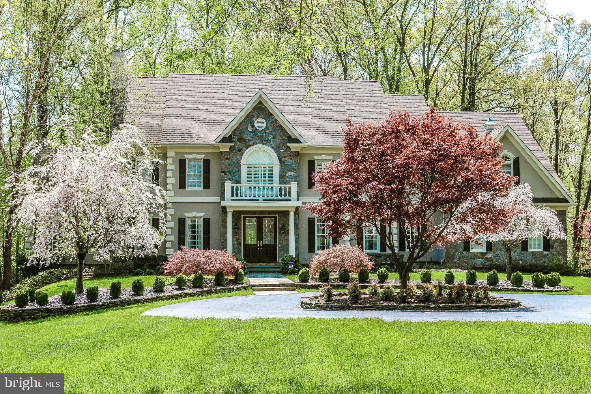 Over 8000 sf of living on three levels with open floor plan and great flow for entertaining.  Handsomely sited at the end of a cul de sac with a circular drive, this mint condition home has spectacular views from every window.  The walkout lower level features an au pair suite, kitchenette, expansive rec room, billiards room, media room and exercise room.