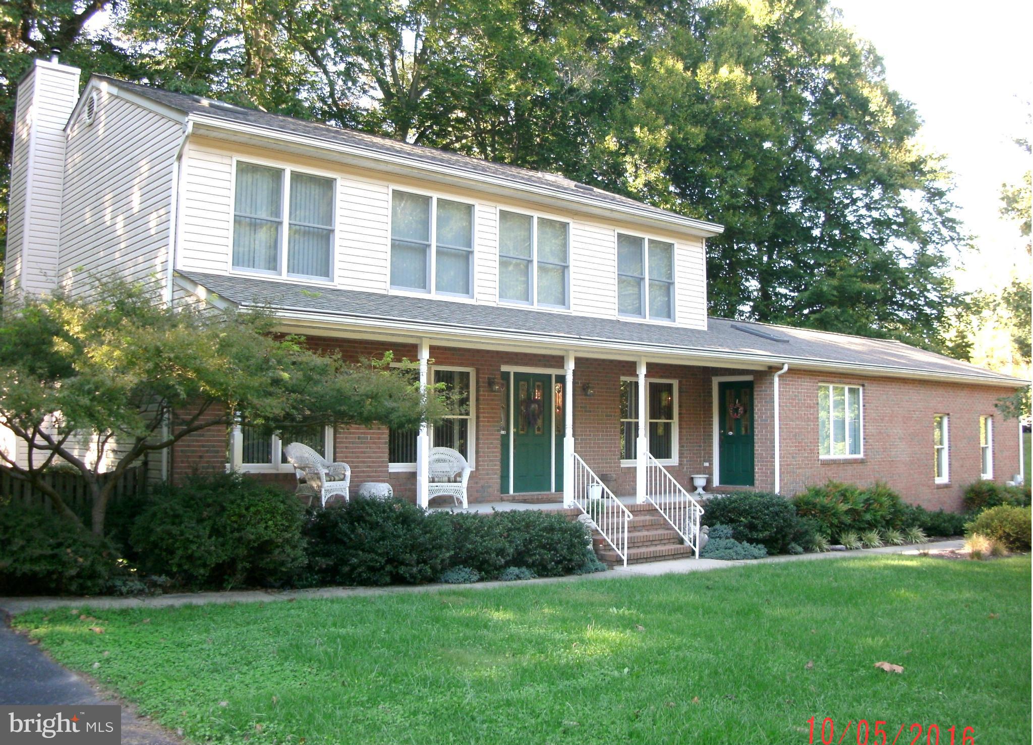 Cathedral ceilings, skylights and French doors make this Holt built porch front colonial bright and open! Spacious great room was once a professional office w/private door. Master BA has jetted tub,double vanity. Fam.Rm.has FP w/pellet insert. Parking for 15 cars +- or boat/RV, patio w/built-in SS grill, 18' above ground pool, new cover & pump, garage has bath rough-in. Andersen windows.