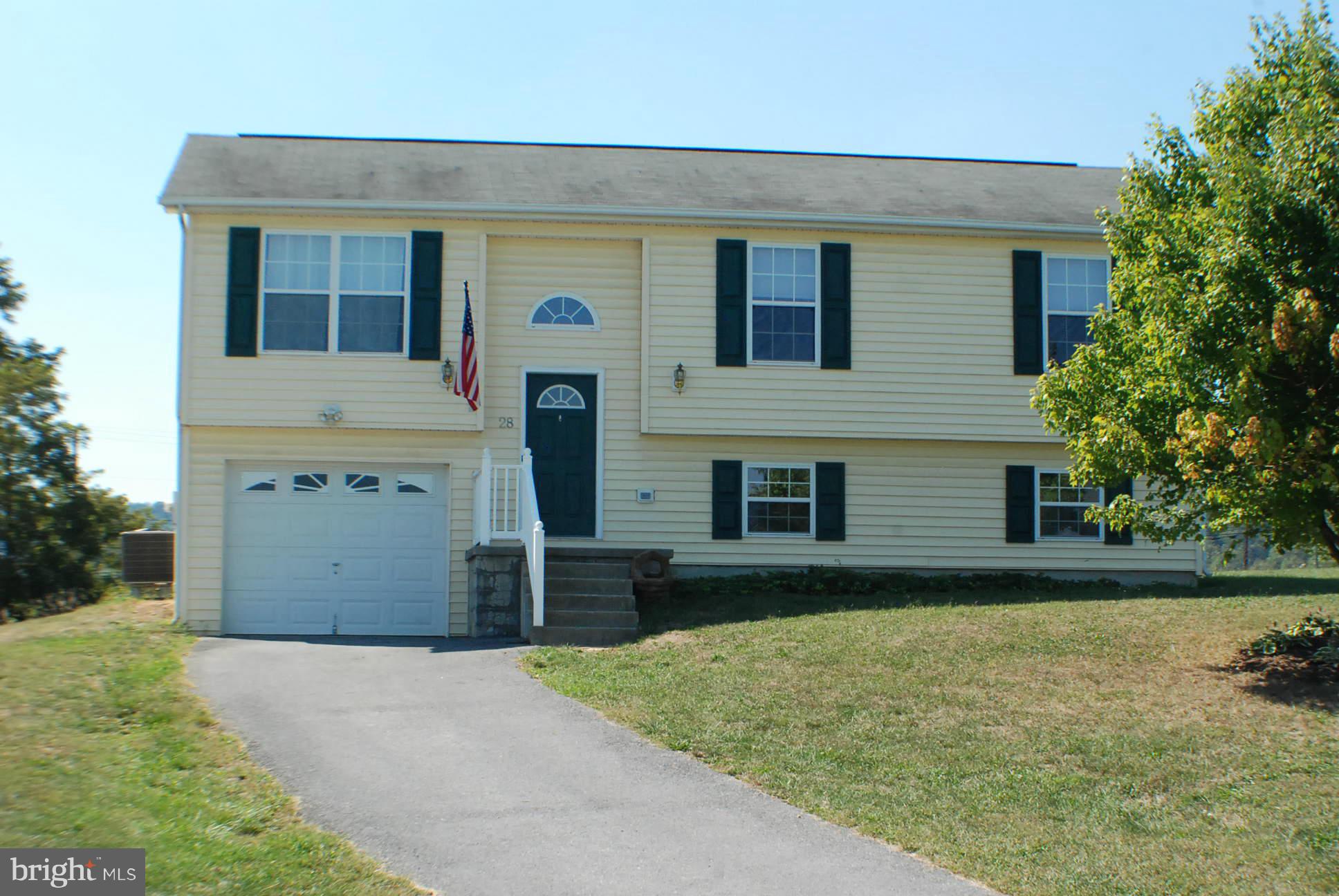 This Split Foyer Has Fresh Paint throughout ,New Carpet on main level,New Laminate and Ceramic Tile in basement Familyroom with full bath,Can be used as Master Suite.Open Kitchen ,Dining,living room great for entertaining. Rear Deck off of dining room.Large rear yard partially fenced with large storge building.Large family room in basement with office nook.New Hvac System,1 Yr Warranty Available .