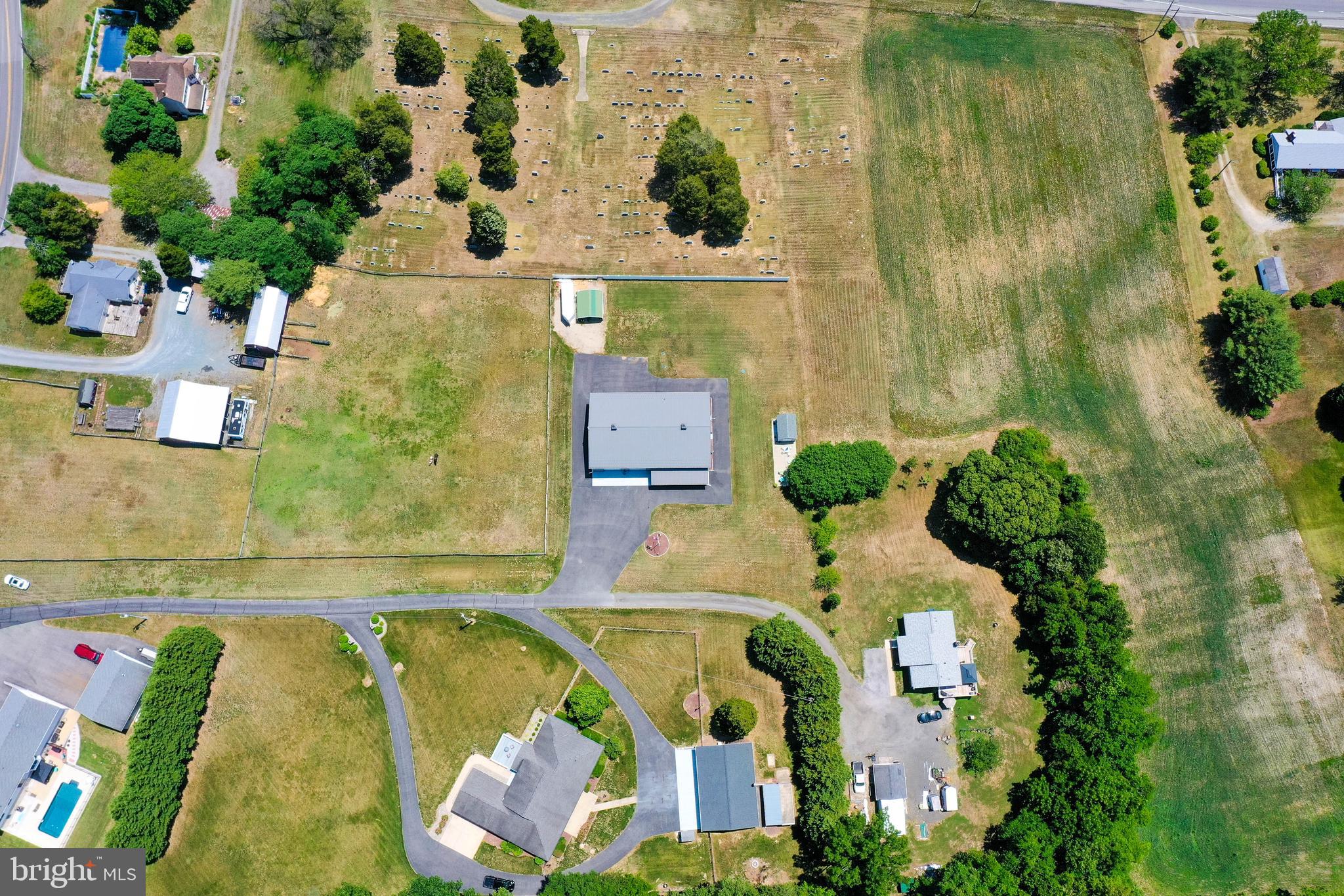 RARE CALVERT COUNTY BARNDOMINIUM WITH UNLIMITED POTENTIAL!
Calling all car enthusiasts, mechanics, collectors, hobbyists, entrepreneurs, RV owners, and anyone dreaming of the perfect live-work lifestyle! This one-of-a-kind modern farmhouse-style barndo offers the ideal blend of residential comfort, incredible workspace, and endless possibilities.
The striking exterior features a slate colored metal roof, modern farmhouse architecture, and oversized garage and shop bays designed to accommodate everything from classic cars and motorcycles to boats, RVs, equipment, and recreational vehicles. With an expansive six-car+ garage, attached workshop, studio space, and massive storage bays, this property is a dream come true for automotive enthusiasts, craftsmen, contractors, hobbyists, or those looking to possibly operate a home-based business.
Inside, you'll find soaring vaulted ceilings, an open-concept design, and spacious living areas that create an impressive yet comfortable atmosphere. The flexible floor plan allows for a variety of uses, whether you're showcasing a prized car collection, creating a custom workshop, operating a business, or simply enjoying the freedom that comes with owning a truly unique property.
Outside, enjoy the privacy and freedom of NO HOA restrictions, giving you the flexibility to use the property to its fullest potential. Opportunities like this are incredibly rare in Southern Maryland.
Ideally located near some of Calvert County's most desirable amenities: • Running Hare Vineyard – approximately 0.10 miles • Hallowing Point Park – approximately 0.75 miles • Public boat launch on the Patuxent River – approximately 2 miles • Convenient access to shopping, dining, and everyday services.
Commuters will appreciate the central location with convenient access to Washington, D.C., Joint Base Andrews, Naval Air Station Patuxent River, Annapolis, and surrounding employment centers.
Situated within the sought-after Calvert County School District, this exceptional property offers the perfect combination of lifestyle, functionality, and investment potential.
Whether you're looking for a showpiece garage, a possible home business headquarters, a workshop retreat, RV and boat storage, or simply a property unlike anything else on the market, this rare barndominium delivers.
Unlimited potential. Endless possibilities. A truly unique opportunity.