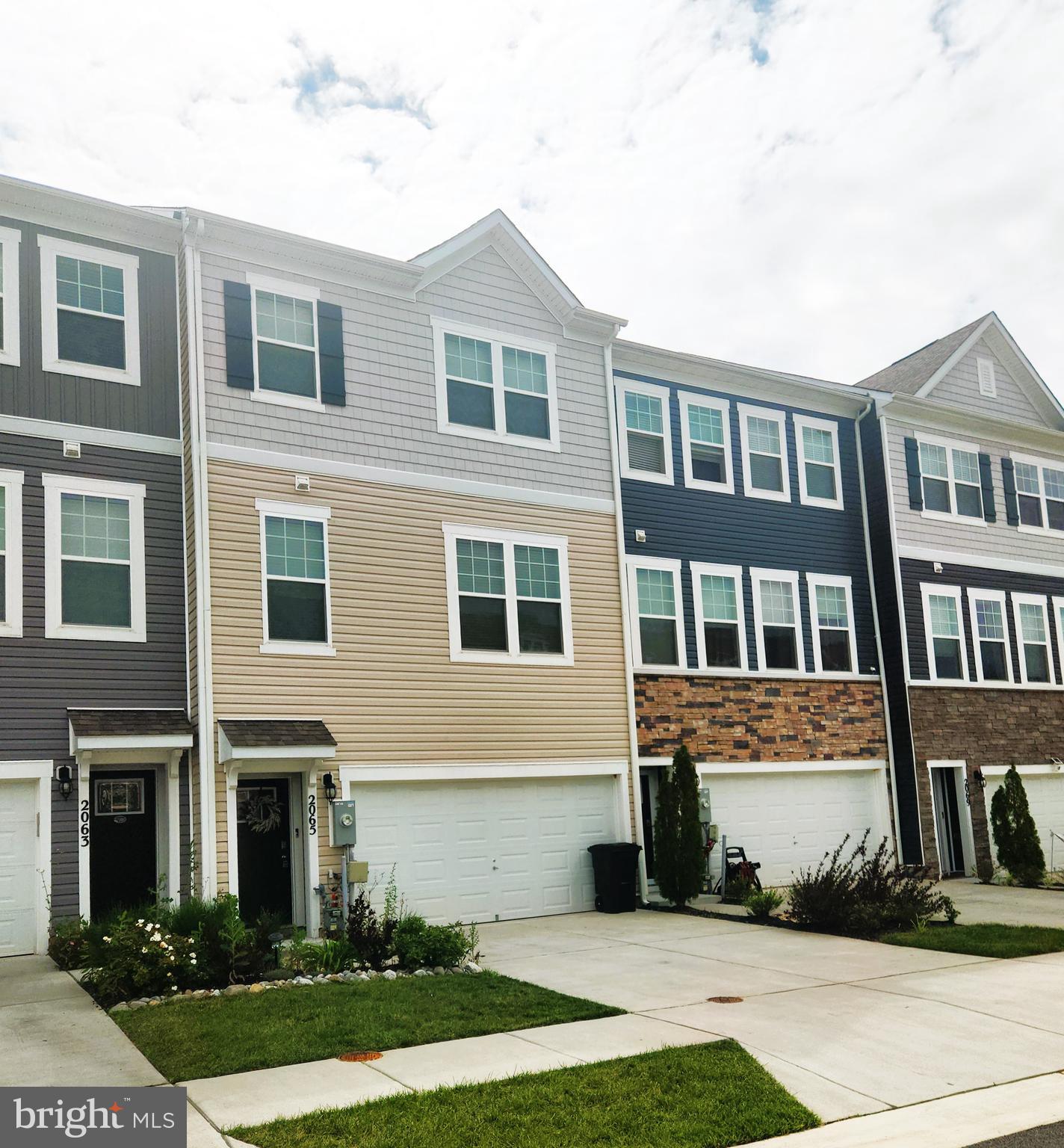 This exquisite TH is located in the sought after community of Severn Oaks in Odenton.
It boasts a spacious open concept design with a polished kitchen featuring: white quartz countertops, custom cabinets, stainless steel appliances and large kitchen island. There is a dining area off of the kitchen that will accomodate a large dining room set and leads to a spaceous deck overlooking a wooded area.
3 bedrooms are on the upper level with a private primary bath and convenient full bath in the hallway. There is a half bath off of the Recreation Room.
There are 3 finished levels with recessed lighting and added ceiling fans.
You'll love the front and rear stairway. The rear stairway leads directly to the Recreation Room with outside access. Perfect for entertaining.
2 Car Garage
DOG Friendly - small dog under 25lbs welcomed!
A walk-in laundry area with full size W/D and shelving will ease to your daily routine. Located in a prime area, this property is close to BWI airport, Fort Meade, National Cryptologic Museum and NSA.
Within minutes to all major commuter routes.