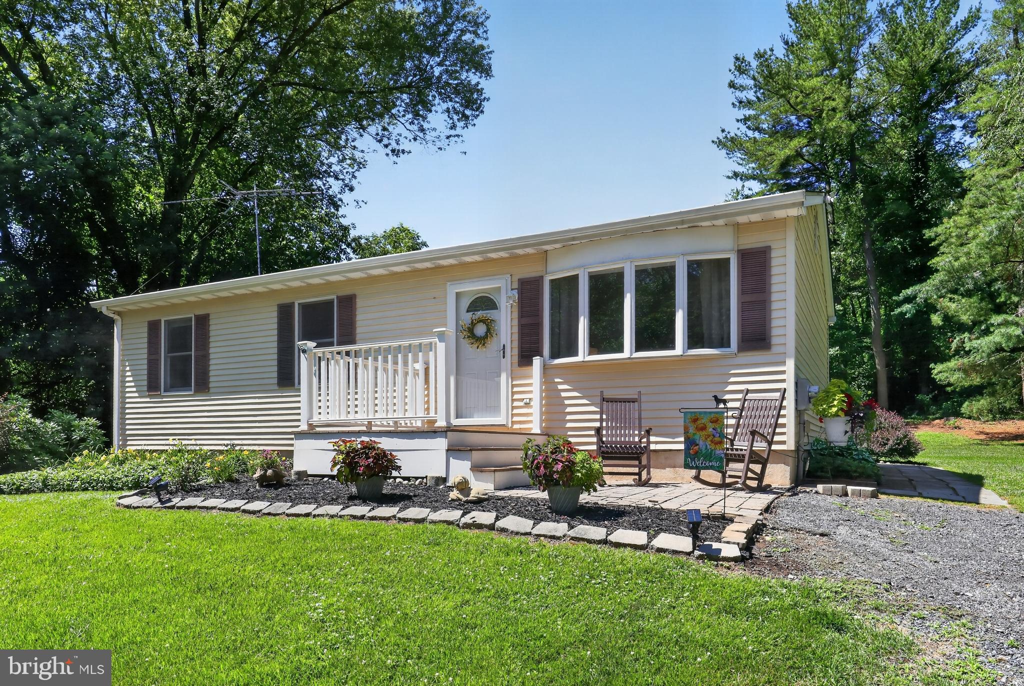 Discover tranquility and comfort with this exquisite ranch home located in the desirable area of Landenberg and desirable AVON GROVE school district ! Offering an incredible blend of countryside charm, this gem of a property is a few minutes' drive from Newark and Route 1. Positioned away from the main road, it serves as a peaceful haven, perfect for inspiring creativity or for finding daily serenity. 
This impeccably maintained ranch home introduces an ease of living with its high-quality Anderson windows and doors, a 90% efficient gas heating system, a fresh coat of paint. Upon entry, you will be immediately drawn to the BRAND NEW Luxury plank flooring installed throughout the main living area. Also featured is a sprawling, fully renovated eat-in kitchen providing ample space equipped with modern conveniences designed to cater to any culinary enthusiast or entertainer. The fully renovated bathroom glistens with stylish neutral tones providing a freas and timeless aesthectic 
The lower-level features a furnished family room, acting as the perfect spot for relaxation or festive occasions. The property also includes a sizeable outbuilding that offers a generous space for hobbies or as a home gym. Abundant outdoor space will be appreciated by pet owners offering a safe haven for pets to play and explore. 
Bask in the breathtaking natural beauty of Landenberg with awe-inspiring views that fill every window. The property is surrounded by a variety of vibrant plantings and a tapestry of local wildlife, becoming your private sanctuary. Enjoy alfresco dining or morning coffee from the expansive rear deck, showcasing a panoramic views. The property is located close to Nichol Park, Elwood L Crossan Park, Peacedale Preserve, White Clay Creek State Park, Big Elk Park, and New London Township Park. Cherish every moment in your own piece of paradise - schedule your viewing today.