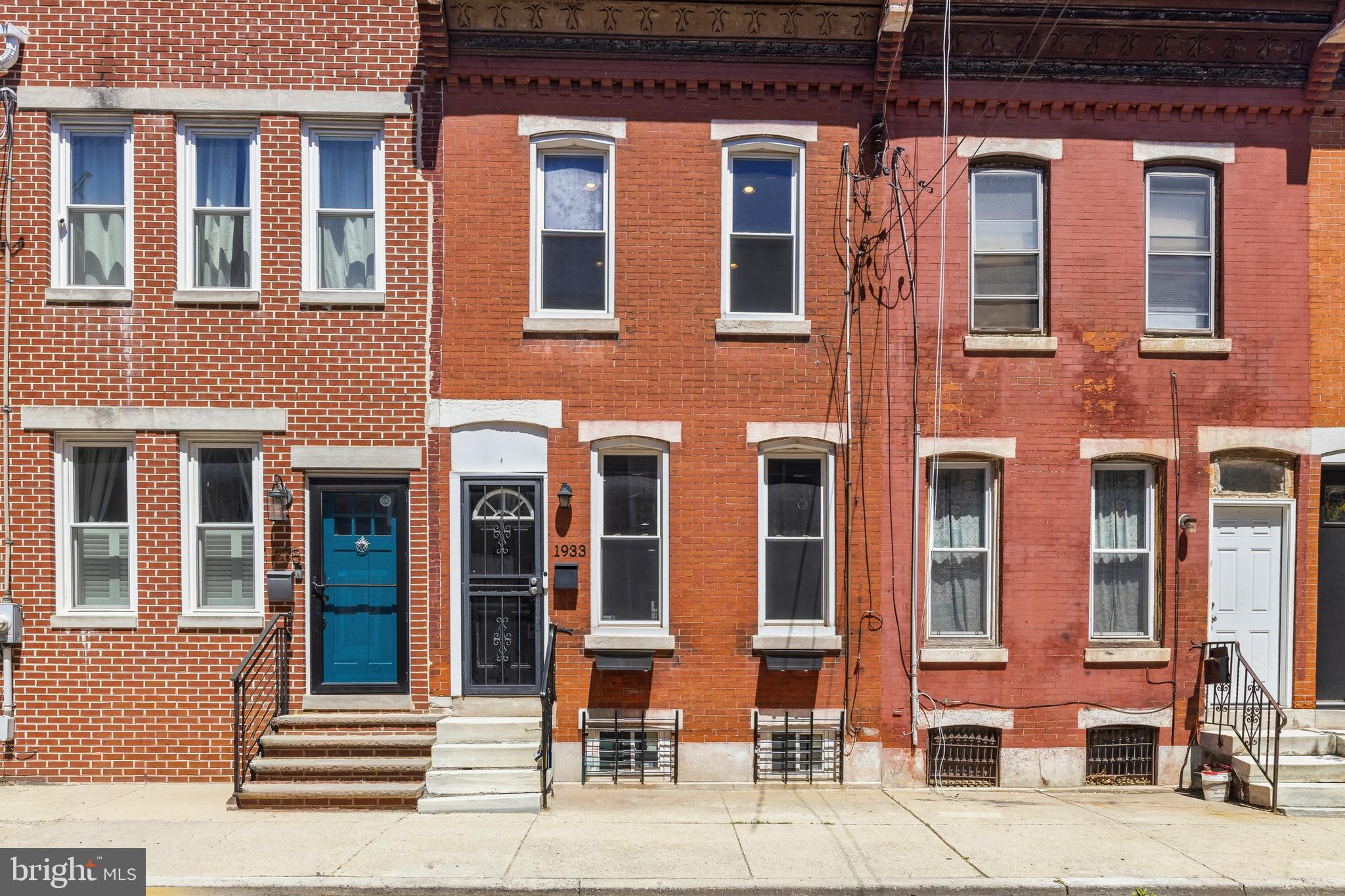 Welcome to 1933 Cambridge St — a bright and inviting interior rowhome in the heart of Fairmount. Ideally situated steps from Eastern State Penitentiary, beloved local shops, and some of the neighborhood's best restaurants, this home offers the best of Philadelphia living with unbeatable access to public transportation.
The main level impresses with an open floor plan that flows effortlessly from the living room through the dining area to an updated kitchen featuring stainless steel appliances — all bathed in natural light throughout. Step right out the back to your private driveway parking spot, a rare and coveted convenience in the city.

Upstairs, two sizable bedrooms are complemented by two fully updated full baths — one with a sleek sliding glass door shower, and the other offering a glass door tub/shower combo. The partially finished basement rounds out the home with a dedicated laundry area and endless potential to customize — whether you envision a home office, gym, or additional living space.

Fairmount charm meets modern comfort at every turn. Don't miss this one.
**Qualified buyers may be eligible for a temporary 1% one-year interest rate buy down. Contact listing agent who will put connect you with one of our preferred lenders for details and full disclosures.