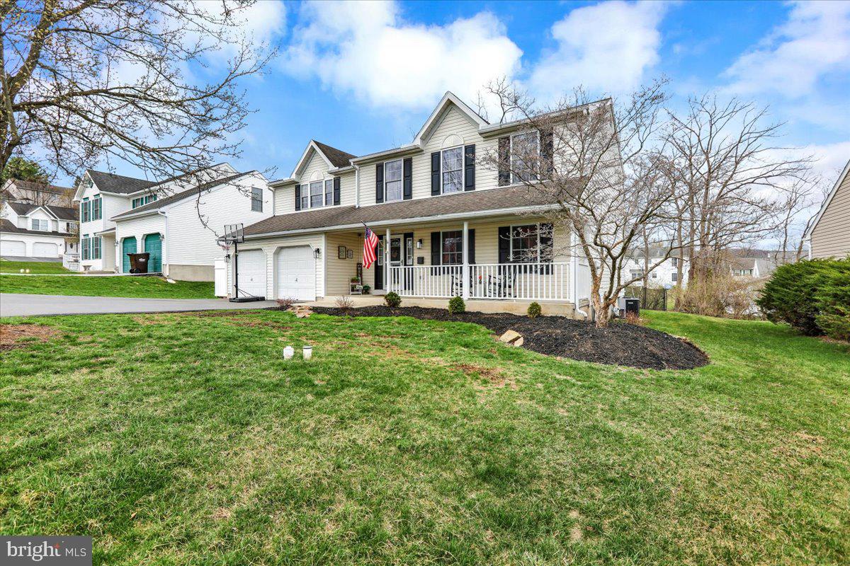 You will fall in love with this charming home conveniently located in Exeter Township.  From the covered front porch into the tile entry is a spacious living room.  Cooking is a breeze in your well appointed kitchen with ample granite countertops and cabinets with under cabinet lighting. This kitchen also features a granite top island with four stools.   Enjoy breakfast and watch the birds from your kitchen table by the patio doors.  Your well designed kitchen is open to a great family room.  Invite everyone over for holiday dinners, the dining room is just the right size. The laundry and a half bath can also be found on the first floor. Upstairs  is an amazing primary suite with a walk in closet, private bath and an area for a home office.  Three other good sized bedrooms and a hall bath can also be found on the second floor.  To the rear of this dream home is a large patio great for picnics or just relaxing. You will also find a firepit area , a raised garden area great for those summer vegetable plants and a nice yard.  Welcome home!