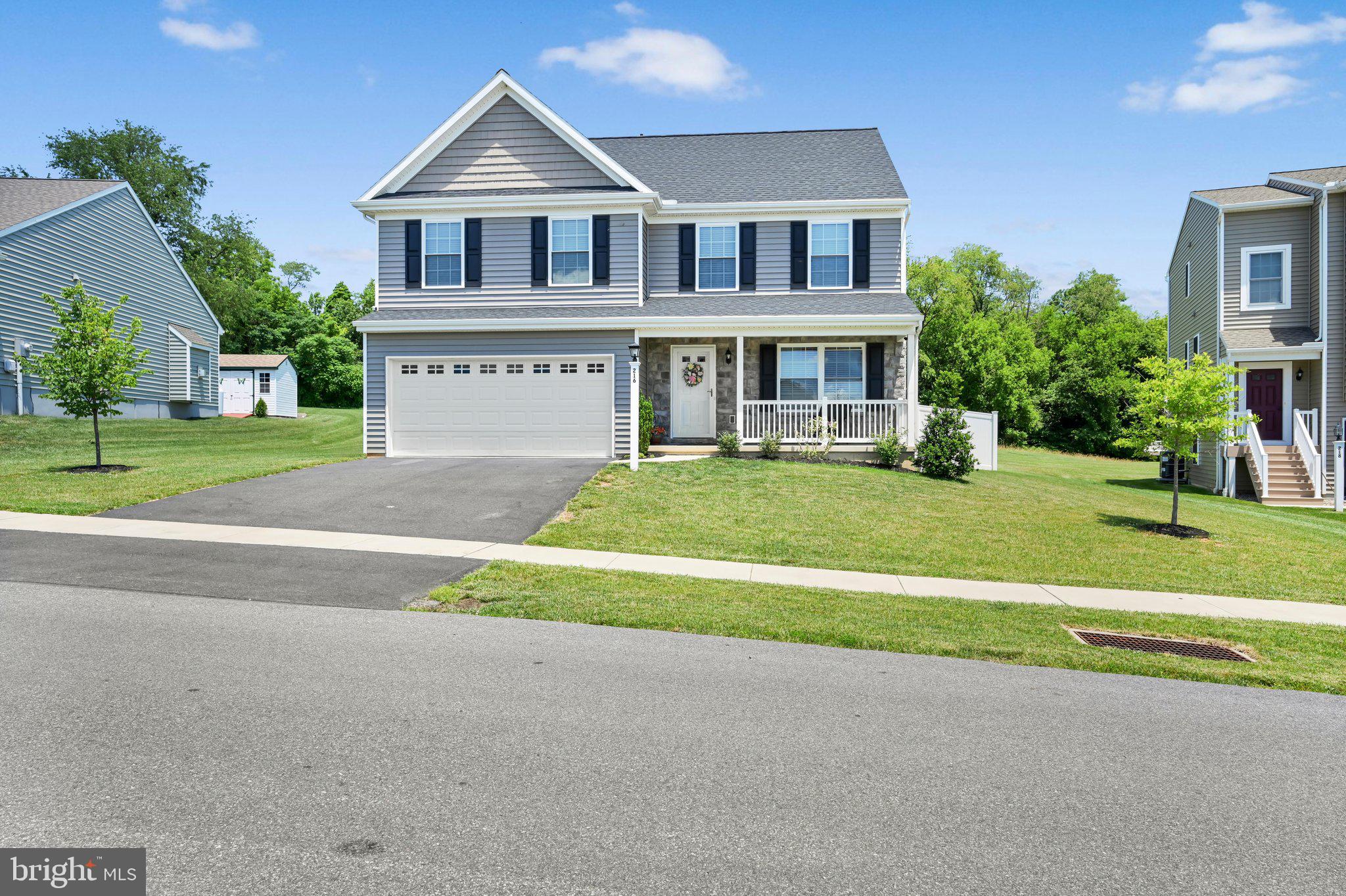 Enjoy checking out this 2022 built 2 story with 4 bedrooms and 2.5 baths with LOTS of upgrades, feels brand new. As you approach the home ,you'll  enjoy the long front porch to relax on Then enter the open floor plan as you approach the living room with vinyl plank flooring and recess lighting. You gaze back to the huge dining area with room for a long table to entertain for those special occasions. The modern kitchen has granite countertops, pantry, all stainless steel appliances that stay & a washer n dryer in the laundry area off the kitchen also stays. Lots of cabinets and countertops. A half bath is also off the kitchen next to the 2 car garage.  In back you'll find a fenced yard for privacy, along with a covered extension over the wood deck with railings to relax in and enjoy the summer weather in the shade. A bonus is the tree lined area behind the property with the bike route to enjoy  for more privacy. (Enola Rail Trail)  Popular Creekside Development, minutes to Quarryville  &  Solanco Schools  

In the upper level you 'll find 4 LARGE  bedrooms. The master( 19 x 18) has it s own walk in closet plus a master bath with  double sinks and a easy to enter shower stall, plus recess lighting and more.
The lower level basement is partially finished with a  long family room to enjoy many activities, plus a bonus room for storage or other purposes.  The heat pump, central air is economical and checked yearly.