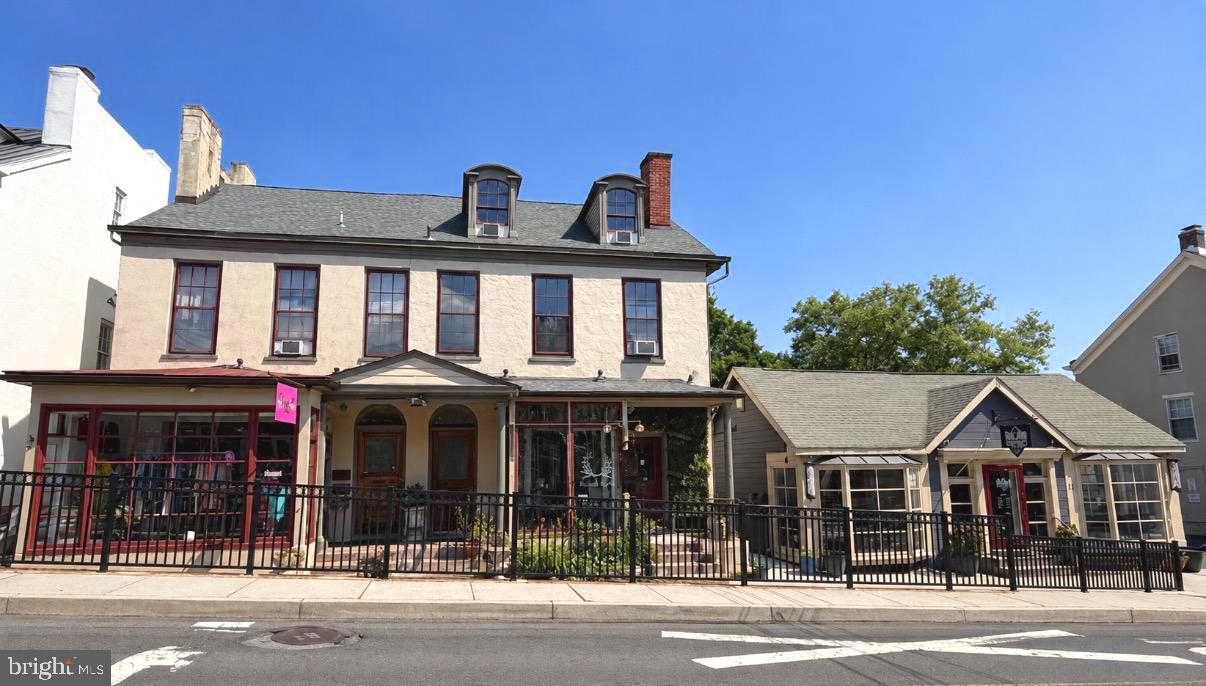An exceptional mixed-use investment opportunity in the heart of downtown New Hope. Prominently positioned along one of the borough's most visible commercial corridors, this fully renovated property consists of three commercial storefronts and six residential apartments, offering a rare combination of strong in-place income, recent capital improvements, and long-term upside in one of Bucks County's most sought-after destinations. The commercial component benefits from excellent street exposure, steady foot traffic, and established tenants, while the residential offerings include a desirable mix of one- to four-bedroom apartments that command strong rental demand. Five of the six residential units have undergone extensive recent renovations, including updated kitchens, bathrooms, flooring, lighting, appliances, and fresh interior finishes. Several units feature multi-level, luxurious townhouse-style layouts, exposed brick, and private outdoor spaces, further enhancing their appeal. Ownership has made substantial investments throughout the property, including exterior painting and maintenance, renovated common areas, new patios and decks, upgraded steps and footings, and roof improvements. A valuable private parking lot located behind the buildings provides a significant competitive advantage in downtown New Hope, where dedicated parking is increasingly difficult to secure. Residents and commercial tenants alike benefit from convenient off-street parking while remaining just steps from the town's renowned restaurants, galleries, boutiques, entertainment venues, and the Delaware River. With a diverse income stream, attractive tenant mix, extensive recent improvements, and an irreplaceable downtown location, this is a rare opportunity to acquire a high-performing investment asset in the center of New Hope, PA.