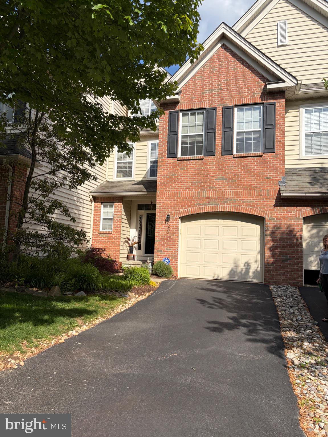 This townhome is move-in ready! The premium lot backs up to a gorgeous, landscaped wooded setting; sit on your deck in complete privacy. Home is open and spacious throughout with plenty of windows for natural light. The kitchen is complete for all your needs with SS appliances, updated quartz countertops, 42" white cabinets, large island and sleek updated backsplash.  Hardwood floors throughout the first floor. 1st floor includes large dining area, separate sitting area with custom built-ins & family room with gas fireplace.  Stairway to 2nd story updated with hardwood. Two bright and roomy bedrooms on 2nd floor with full bath including tub.   Use the spacious 3rd floor as a bedroom or keep it as an office. The master bedroom on 2nd level is private and spacious.  Relax in the huge soaking tub at the end of the day with updated beautiful, neutral tile and updated luxury shower in the Master bath. The master bedroom and upper hallway all newer hardwood.  Plenty of closet space including a walk in and double door closet. The convenient laundry area is on 2nd floor.  The basement level is fully finished with new flooring, new carpet on stairway, large powder room, ample storage and large daylight window. Book a tour soon, this updated townhome with lot premium & many upgrades won't last at this price!