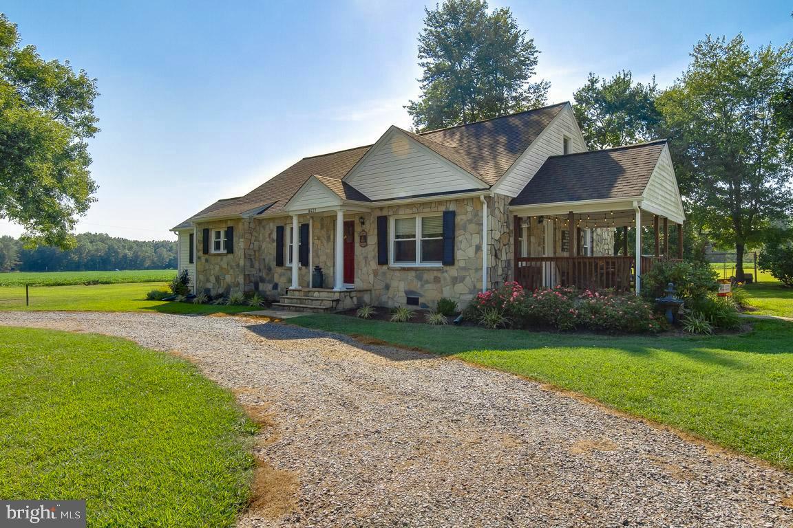 Stunning Renovated Stone Rambler on 2 Acres – A Peaceful Retreat Full of Comfort & Charm!This remodeled rambler is nestled on 2 open and flat acres, offering a welcoming atmosphere from the moment you arrive. Surrounded by mature trees and beautiful landscaping, this property provides a park-like setting with space to garden, relax, and fully enjoy the outdoors. Whether sipping sweet tea on the side porch or stargazing in the evenings, this home offers the perfect space to unwind. A circular driveway enhances the home’s inviting curb appeal, providing ample parking. Inside, the open-concept layout features wide-plank wood floors, a cozy living room with a decorative mantle, and a stylish kitchen with granite countertops, stainless steel appliances, a breakfast bar, and a coffee bar/buffet perfect for hosting or everyday living. A sliding barn door leads to the laundry area and a 4th bedroom (NTC/no closet). Both bathrooms are tastefully updated with granite and tile finishes. Upstairs is perfect for a teen suite or home office complete with new carpet, shiplap accents, and custom built-ins. A $2,000 carpet allowance is included for the remaining bedrooms. The detached 2-car garage offers a workbench, separate electric service, and a 29x8 lean-to for extra storage.  Stay connected with high-speed internet options from Starlink or iWisp. No HOA! Conveniently located just minutes from Route 1, I-95, the upcoming Kalahari Waterpark, and Lake Anna—you’ll enjoy both peaceful living and easy access to fun and convenience. Owner/Agent – Seller has found Home of Choice/Coinciding Settlements.  Call or text to schedule your private showing (by appointment only due to dog).