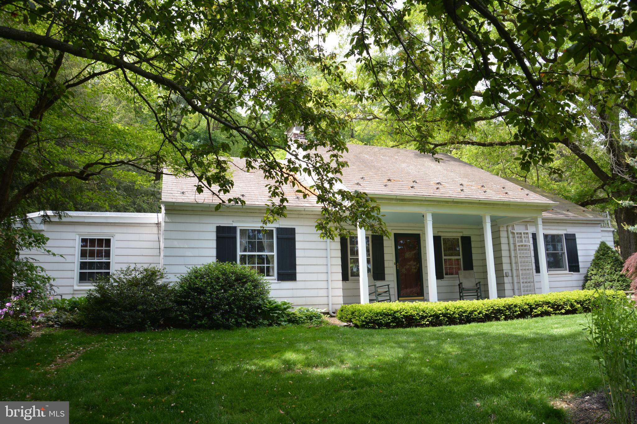 Fantastic East Hempfield cape on 1/2 acre lot with mature landscaping and hardscaping as well. Inside, a wide open Living Room welcomes you and is central to the home. There's also a wood burning fireplace to enjoy this Fall and Winter! There are two bedrooms and bath and a half on this level as well as a very nicely appointed kitchen with granite counters and all appliances included! The bedrooms on this level are large and the main bath has been renovated to include heated stone floors and stone trim as well. Other rooms include a lovely formal dining room  with hardwood floors and huge Family Room with 1/2 bath. Upstairs contains 3 large rooms which can be left to your imagination as to how to use!  (See attached floor plans) The third room also accessed the shaded  garage roof deck. Out back, a lovely patio is surrounded by gardens and stone stairway leads to the the upper part of the lot. Amazing stone fireplace needs restoration, but could be even more amazing!  The HVAC has been upgraded (heat in 2015 and C/A in 2019) and features a high efficiency natural gas furnace and water heater.