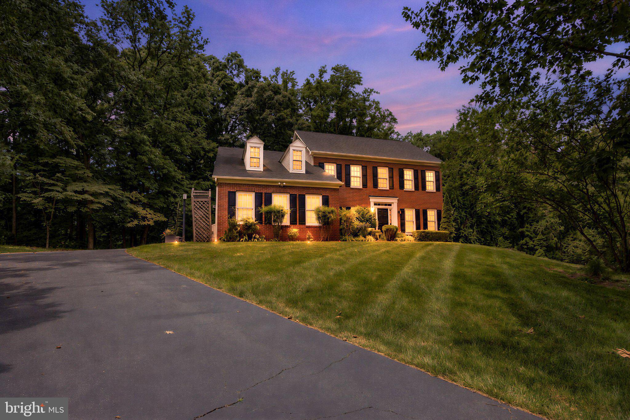 Nestled in the prestigious Wynnewood community, this exquisite Colonial-style residence offers a harmonious blend of luxury and comfort. Spanning an impressive 4,708 square feet, the home features a thoughtfully designed traditional floor plan that invites warmth and connection. Step inside to discover a gourmet kitchen, complete with upgraded countertops, a spacious island, and a cozy breakfast area, perfect for casual dining. The kitchen seamlessly flows into a family room adorned with recessed lighting and a stunning gas fireplace, creating an inviting atmosphere for gatherings. Formal dining and separate living areas provide elegant spaces for entertaining. Retreat to the fully finished basement, ideal for recreation or relaxation, while the main floor laundry adds convenience to your daily routine. Each bedroom boasts ample room storage for your wardrobe. Outside, the property is a private oasis on 1.42 acres, featuring a heated saltwater pool surrounded by a fenced patio, perfect for summer days and evening soirees. The attached three-car garage and asphalt driveway offer ample parking and easy access. With meticulous attention to detail and high-end appliances, including a double oven and built-in microwave, this home embodies an exclusive lifestyle. Enjoy the benefits of a well-maintained community with amenities such as snow removal and common area maintenance, allowing you to focus on what truly matters-creating cherished memories in your new home.