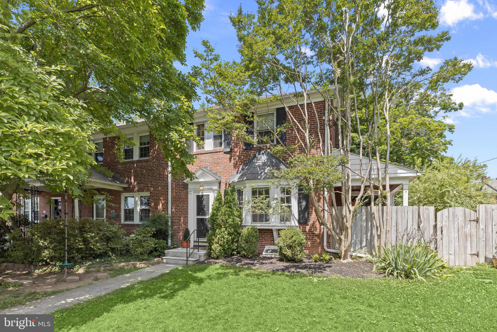 Welcome to this exceptional 3-bedroom, 2 full and 1 half bath end-of-group home with an easily convertible fourth bedroom, nestled in the picturesque, tree-lined community of Rogers Forge. Beautifully landscaped grounds create a warm welcome as you step inside to a bright and inviting living room featuring rich hardwood flooring, elegant crown molding, a pleasing neutral color palette, and a sunny bay window that frames peaceful views of flowering gardens and mature trees. A cozy wood-burning fireplace and direct access to the side patio make this an ideal space for both relaxing and entertaining.
A graceful arched entry leads to the dining room, where crown molding, chair rail, and hardwood flooring continue the home's timeless appeal. The dining area flows seamlessly into the gourmet-inspired kitchen, thoughtfully designed with a quartz peninsula offering casual seating, recessed and pendant lighting, stainless steel appliances including a Bosch gas range, and a classic subway tile backsplash. Step outside to the platform deck overlooking the private, fenced backyard enhanced by mature trees, tranquil landscaping, and a detached one-car garage.
Retreat upstairs to the comfortable sleeping quarters featuring a spacious primary suite with a private en suite bath, two additional generously sized bedrooms, and a second full bath. The finished lower level expands the home's versatile living space with a welcoming recreation room highlighted by a gas fireplace, a bonus room that easily serves as a fourth bedroom, home office, or exercise room, along with a powder room, laundry area, and walk-up access to the backyard.
Perfectly blending timeless character with modern updates, this beautifully maintained home offers the ideal combination of comfort, style, and functionality in one of the area's most sought-after neighborhoods. Come experience everything Rogers Forge has to offer and make this wonderful home your own.