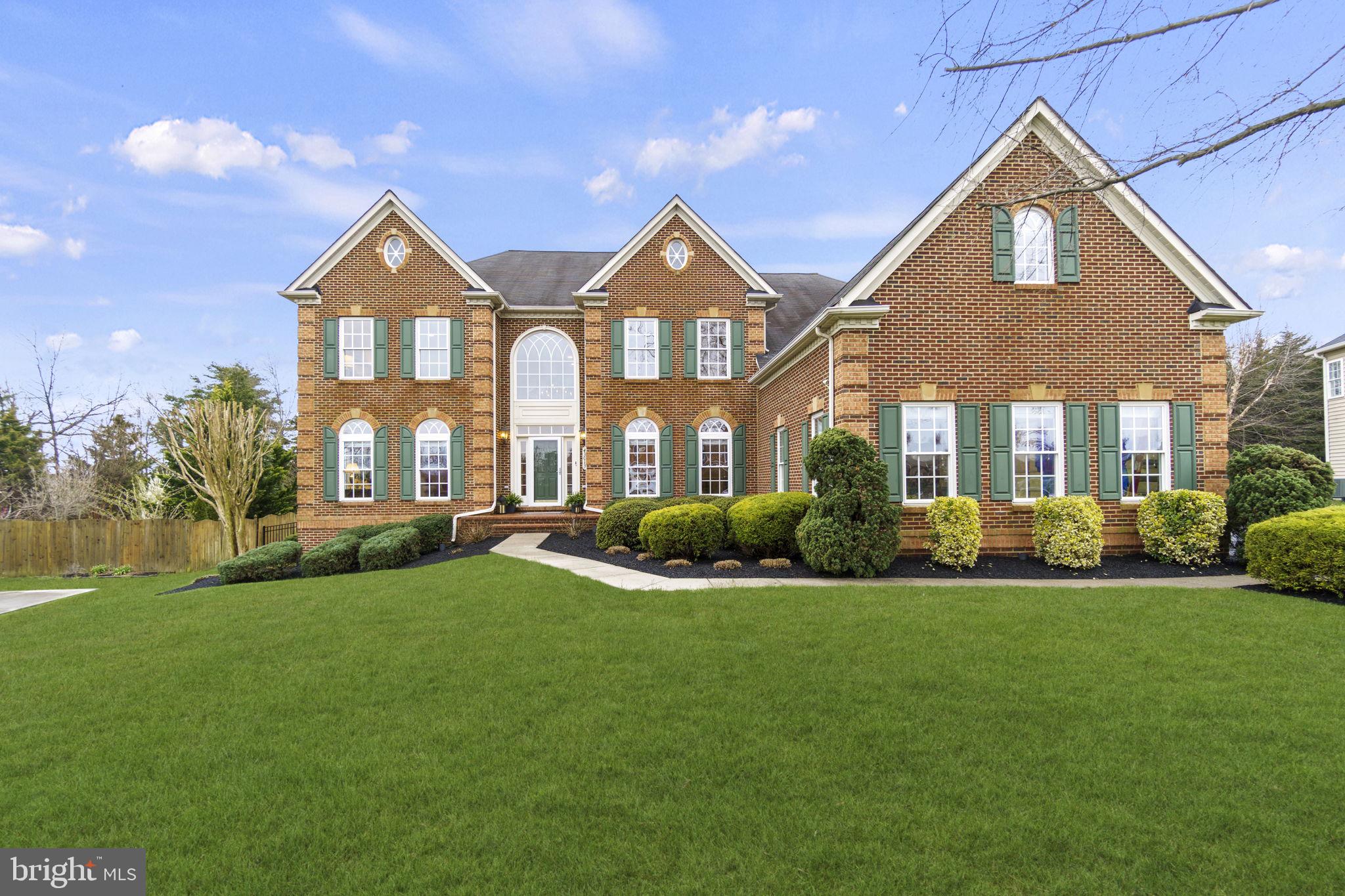 AN ENTERTAINER'S GALORE!!! This distinctive  "Clifton Park" model  estate home built by NVHomes is the definition of luxury and comfort. It is perfectly situated on  a .69 acre lot backing to a wooded area,  in Loudoun's sought-after and upscale  community - The Lakes at Bella Terra . This beautifully maintained home offers 7,400 square feet of exquisite living space spanning over 3 levels, with a modern open floor plan, featuring deep moldings, two staircases, architecturally striking picture and bay windows, a speaker system, and high ceilings. 

The  grand two-story foyer and it's dramatic staircases welcome you home. The main level offers a formal living room and dining room , a large private office, a powder room, a spacious laundry room, gleaming hardwood floors and ornate chandeliers. 

The two-story great room is in the heart of the home with custom designed recessed wall niches, a gas fireplace and a wall of windows overlooking the backyard. The gourmet kitchen is every Chef's dream with a massive center island, granite countertops and stainless steel appliances. It has ample cabinet space, a walk-in pantry in addition to a butler's pantry, complete with a cozy morning room where you can enjoy your meals with great views. 

The owner's suite  hosts a sitting room, a massive his & hers walk-in closet and a custom designed timeless bathroom which received the Wood Diamond Award in 2021. There are three additional expansive bedrooms, all with walk-in closets and en-suite bathrooms, on the upper level.

The fully finished lower level is spacious and offers plenty of space to play and entertain. It includes a full bar, exercise room with built-in mirrors, billiards area, former wine room which is now used as a den, recreation room with gas fireplace, a full bath, a storage room and an intimate theater room with tiered seating.

Recent updates include full interior painting,  award winning primary bathroom remodel, new storm door, new refrigerator, new door knobs, new carpet & padding, plantation shutters in the family room, LVP flooring in basement, installation of fence, resurfaced asphalt driveway and epoxy garage floor.

The outdoor living spaces feature a large screened porch, two custom decks with composite flooring, pergola, and professionally manicured gardens and lawn. Never run into parking issues with a 3-car side entry garage, ample parking space in the driveway and street parking. 

Not only does this stately home have all the bells and whistles, it is also located in a desirable location. Close to Brambleton shopping center and Broadlands shopping center. Only 1mile to the Silver line metro and 15 minutes from Dulles International Airport. Close to major commuter routes such as Dulles Greenway, Rt 28 and Rt 7.