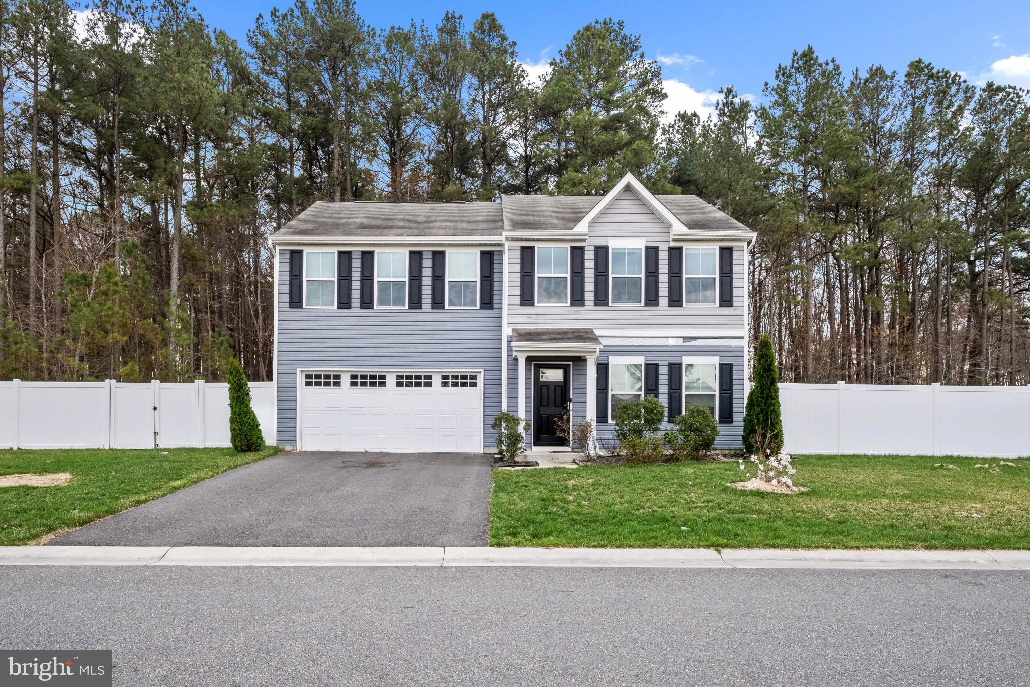 Charming Colonial in Prime Delmar Location!
Welcome to this large 4-bedroom, 2.5-bath Colonial home, just 6 years young and perfectly situated in a desirable Delmar neighborhood.  Just a little TLC and this home will be wonderful home for years to come.  Enjoy the convenience of being close to shopping, grocery stores, and everyday essentials while still tucked away in a quiet, peaceful setting.

This spacious home offers over 1,900 square feet of living space, including a versatile flex room—ideal for a home office, playroom, or additional living area to suit your needs. The primary suite features a private en-suite bath, and generous closet space can be found throughout the home.

Step outside to a large backyard designed for both relaxation and entertaining, complete with a patio, fire pit, and privacy fence. With added space between neighboring homes, you’ll appreciate the extra sense of privacy—perfect for gatherings or quiet evenings at home.

A wonderful blend of comfort, space, and location—this home is ready to welcome its next owner!